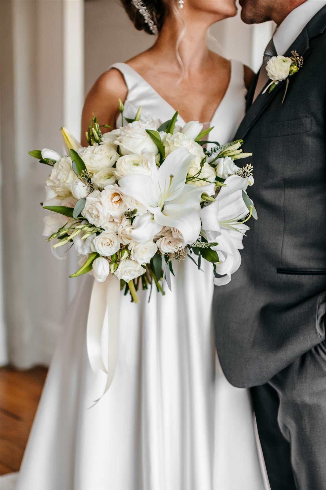 white and green bridal bouquet with lilies.jpeg