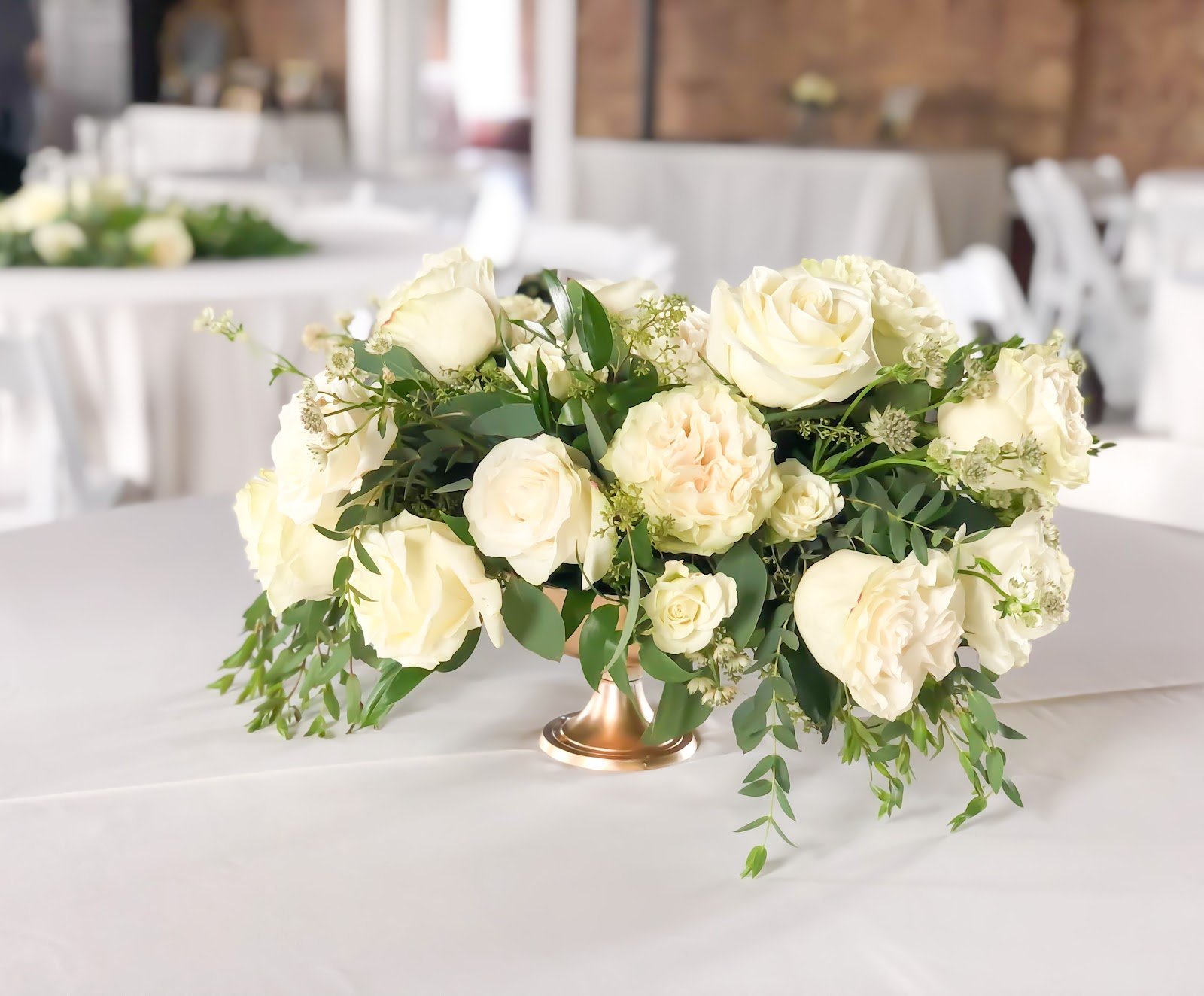 white flowers in gold compote bowl.jpeg