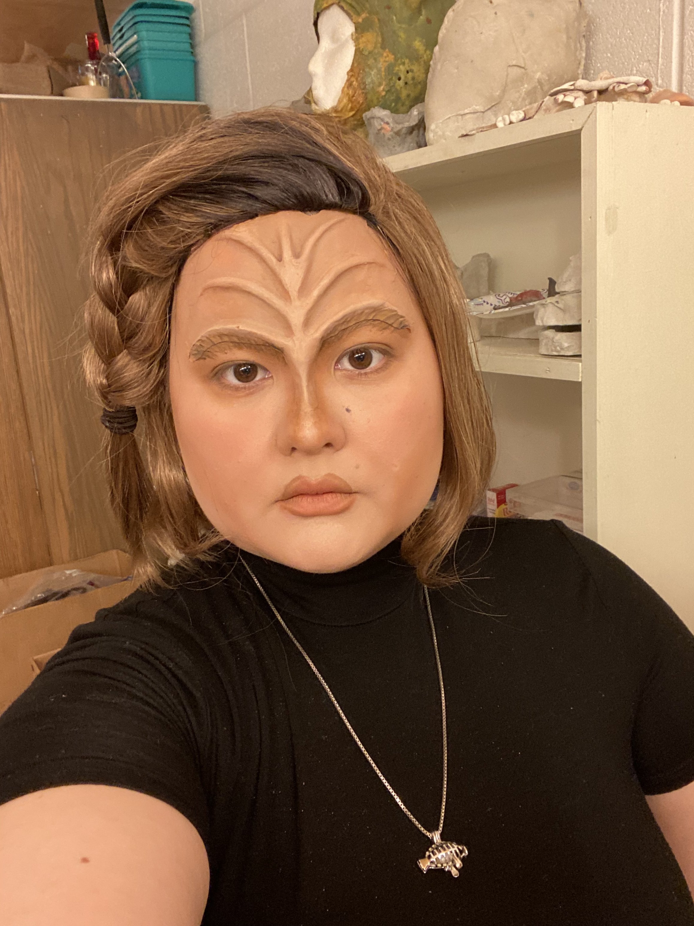 B'Elanna Torres look created with latex forehead prosthetic, creme makeup, and wig.