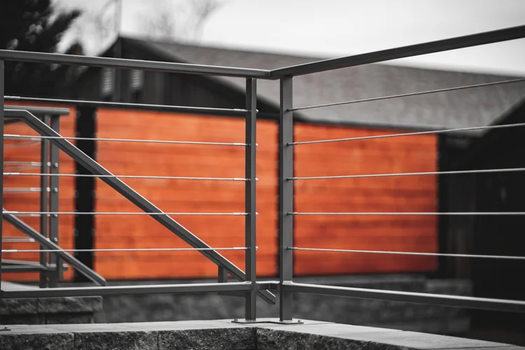Metal railing with horizontal cable infill