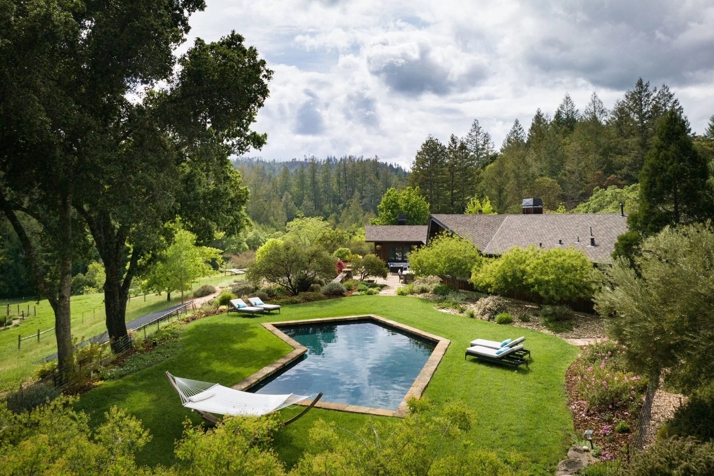 0_+The+Estate+Villa+-+Outdoor+Pool+-+NewTree+Ranch+-+Photograph+by+Rachel+Weill.jpg