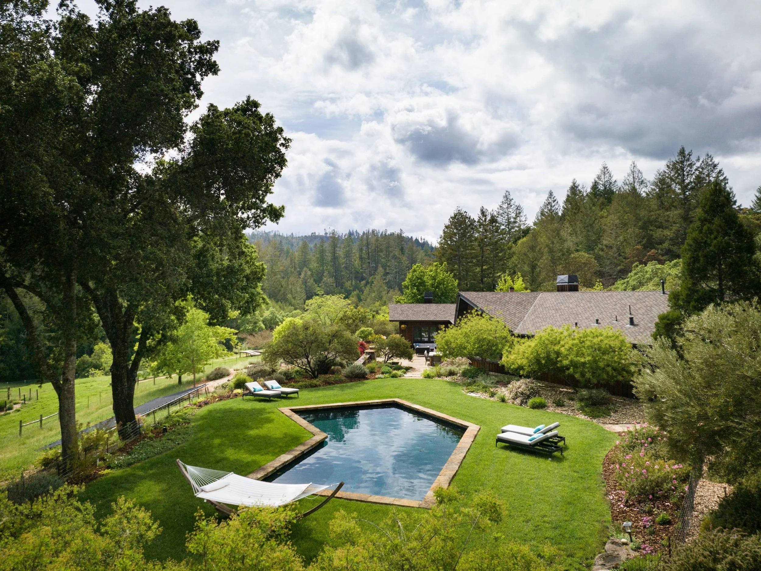0_+The+Estate+Villa+-+Outdoor+Pool+-+NewTree+Ranch+-+Photograph+by+Rachel+Weill.jpg