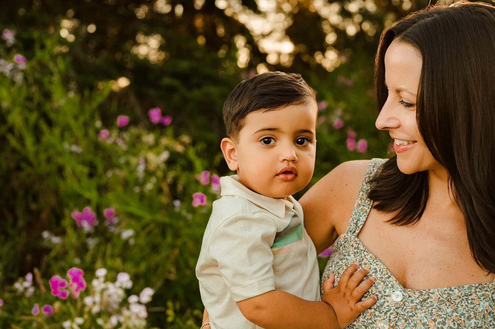 family photography in seattle made easy. Mom holding her son lovingly looking at him.
