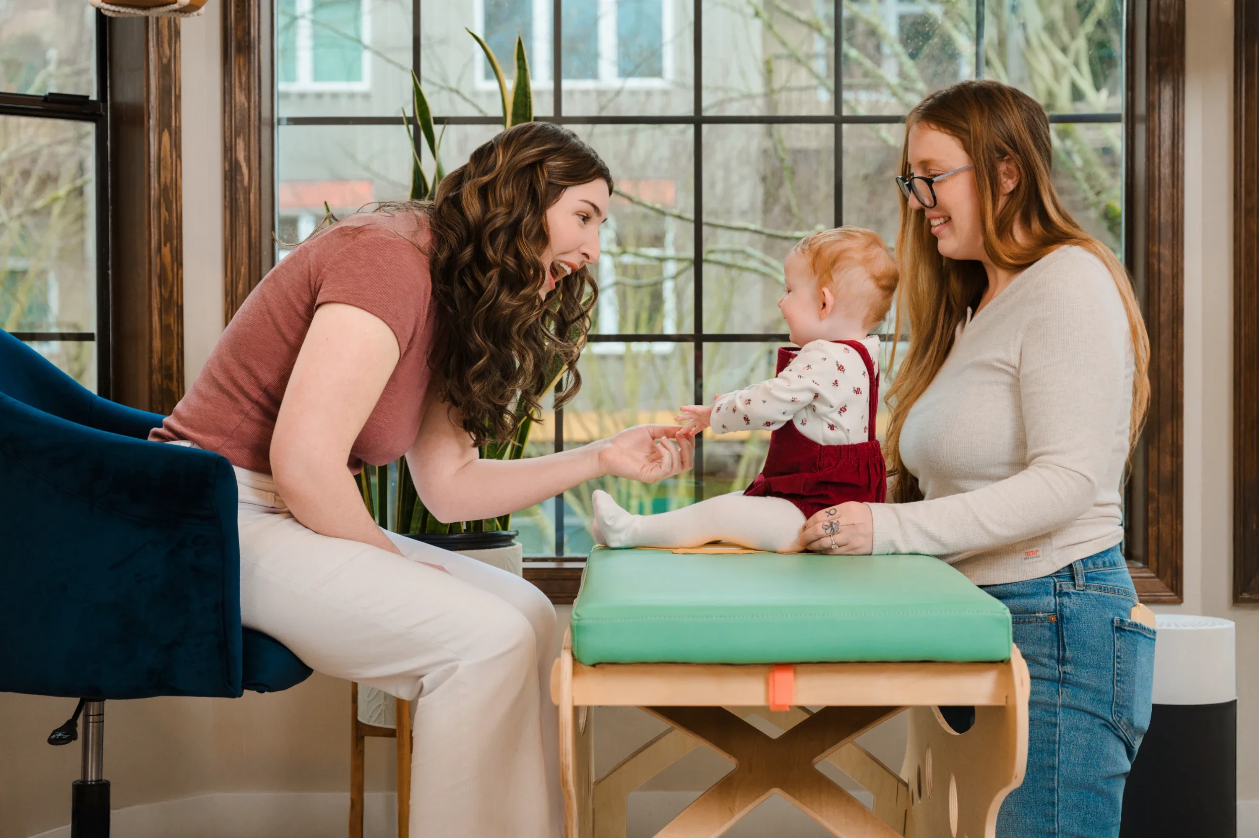 Wellness business owner working with a client during a branding photo shoot