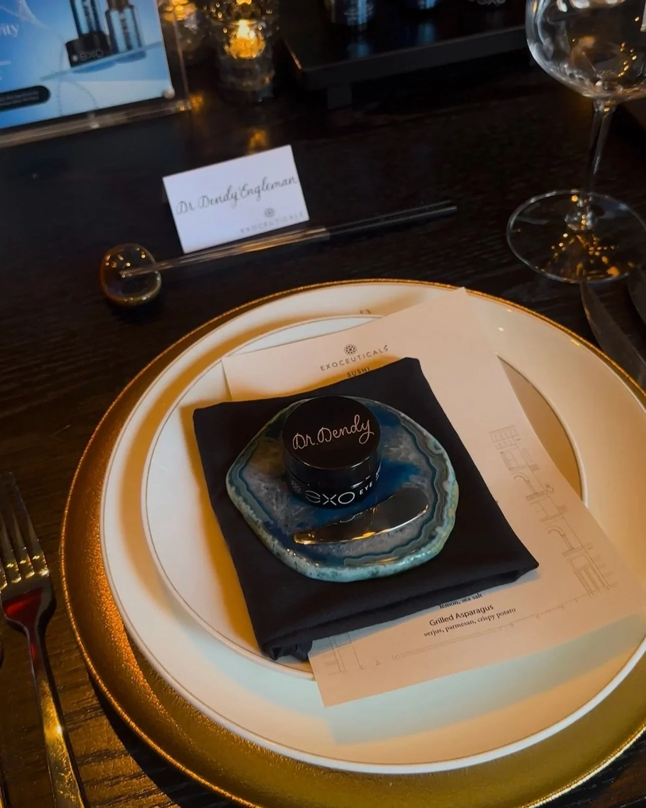 engraved beauty product and calligraphy place card
