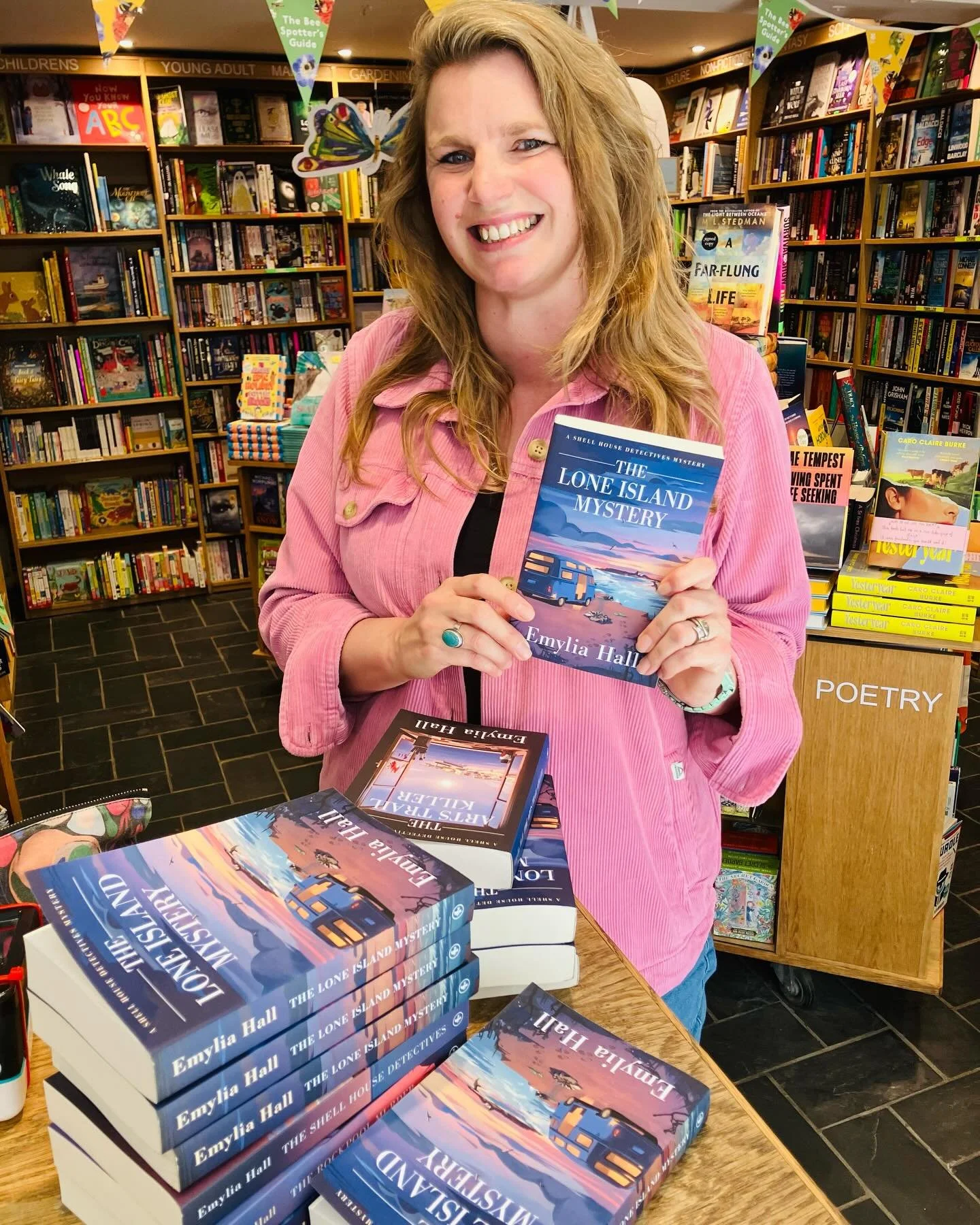 A beautiful day for signing books in St Ives 🐚🩵 Thank you so much @stivesbookseller for the support with The Lone Island Mystery - and the entire series! ✨ It&rsquo;s lush to be here, in the Shell House heartland, having a little bask 🌊☀️ 

#thelo