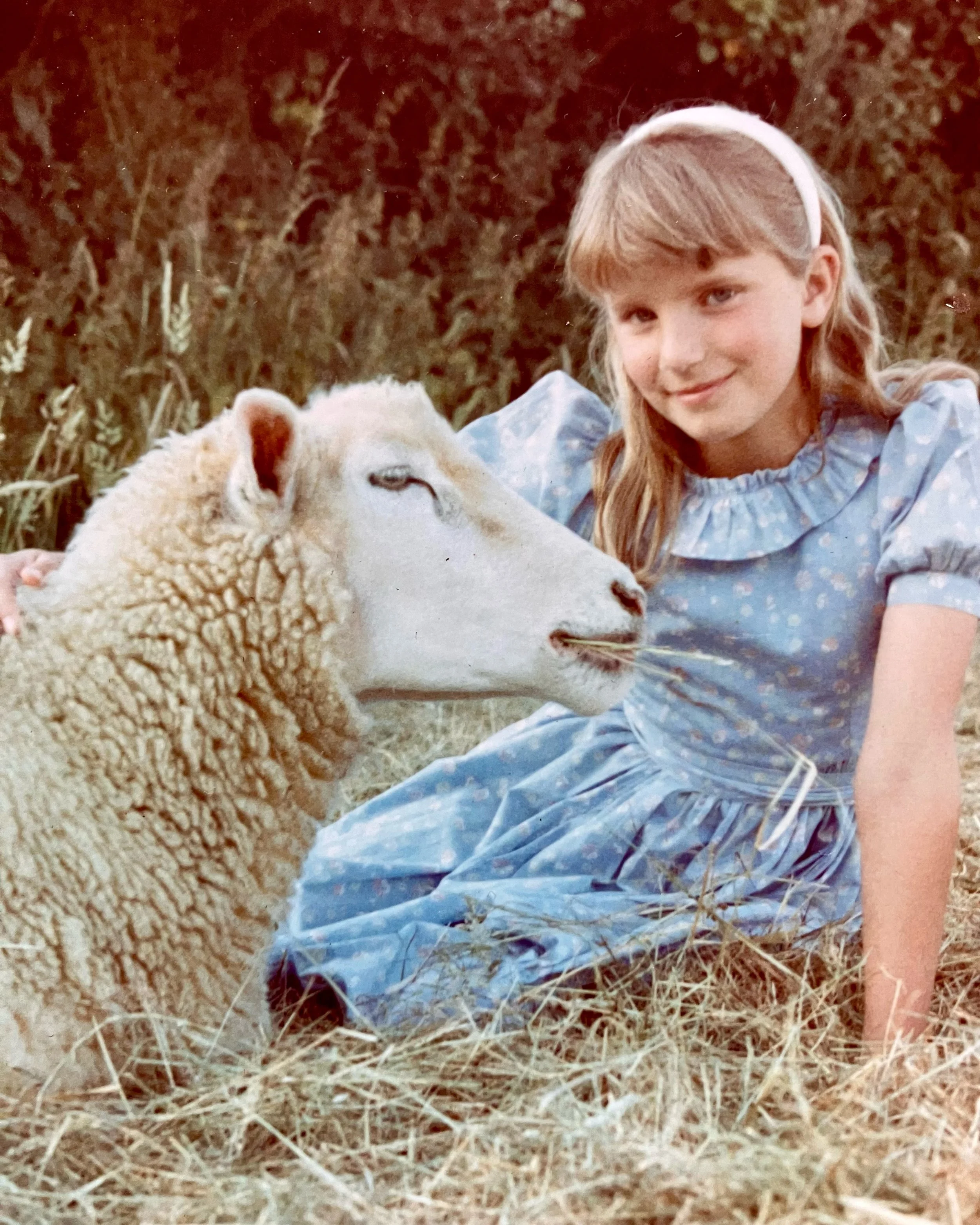 There&rsquo;s growing up in the country and then there&rsquo;s growing up in the country&hellip; 🐑😂 Going through old photos with my son and found this classic. Pretty sure I was forced into the Laura Ashley dress, but the Alice band was, alas, all