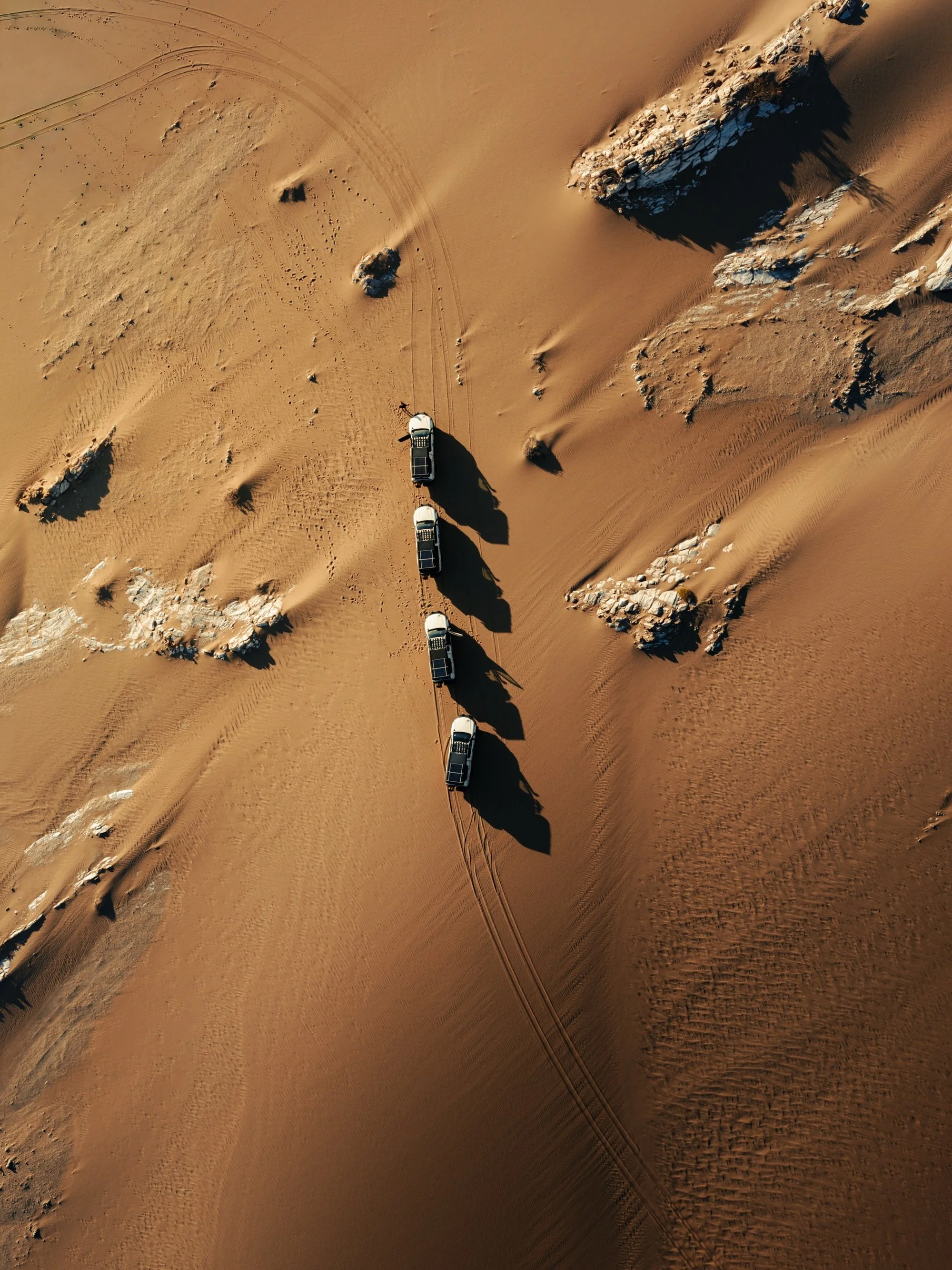 Drove hours across the Namib Desert and suddenly realized we were above the clouds. So we did the only right thing.. we set up camp and watched the sun dip below the horizon 🔥

All photos edited with @care4art.co

#dronephotography #fromwhereidrone 