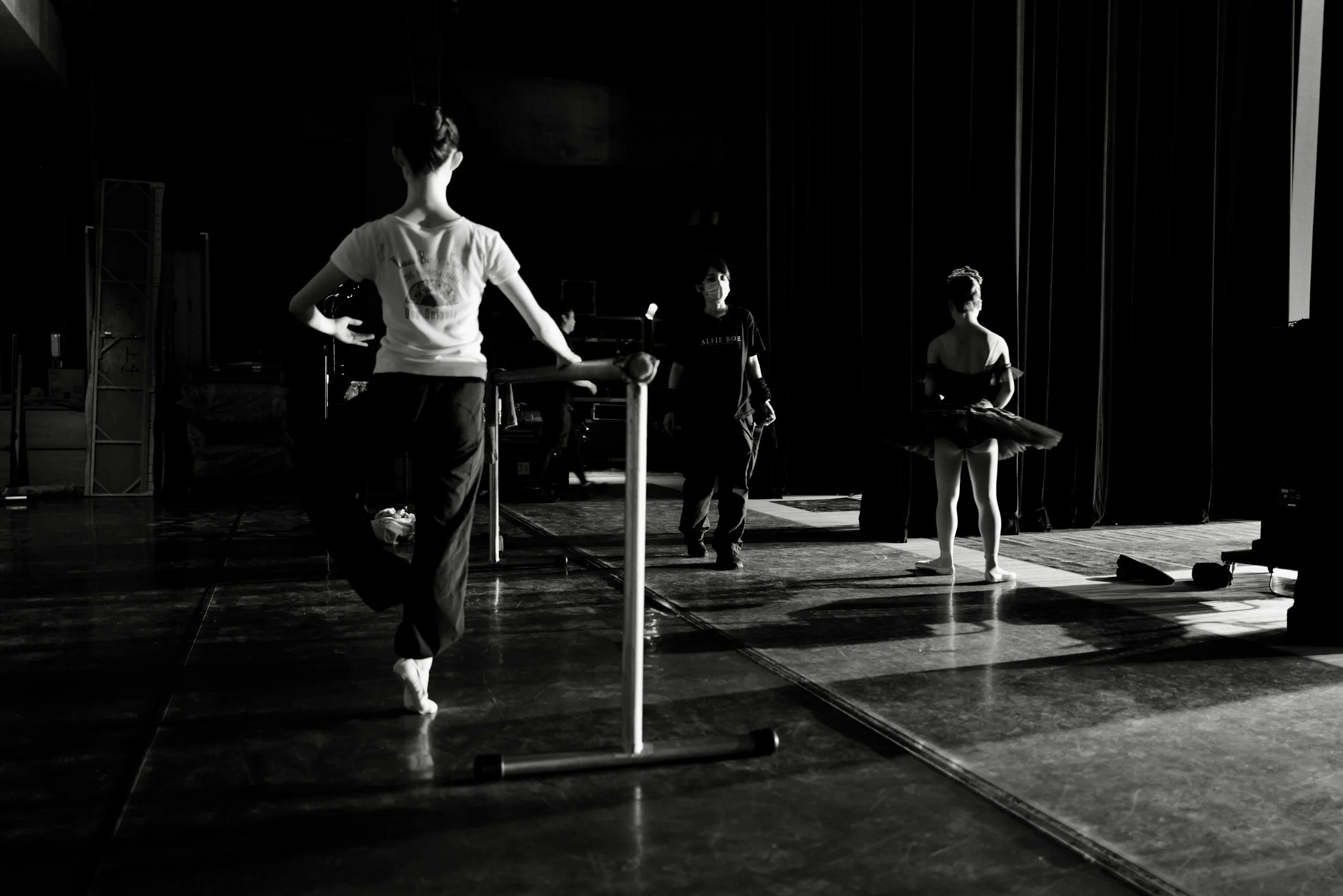 Close-up of a dancer in satin pointe shoes during the Ballet Pointes level class at Shoonya.