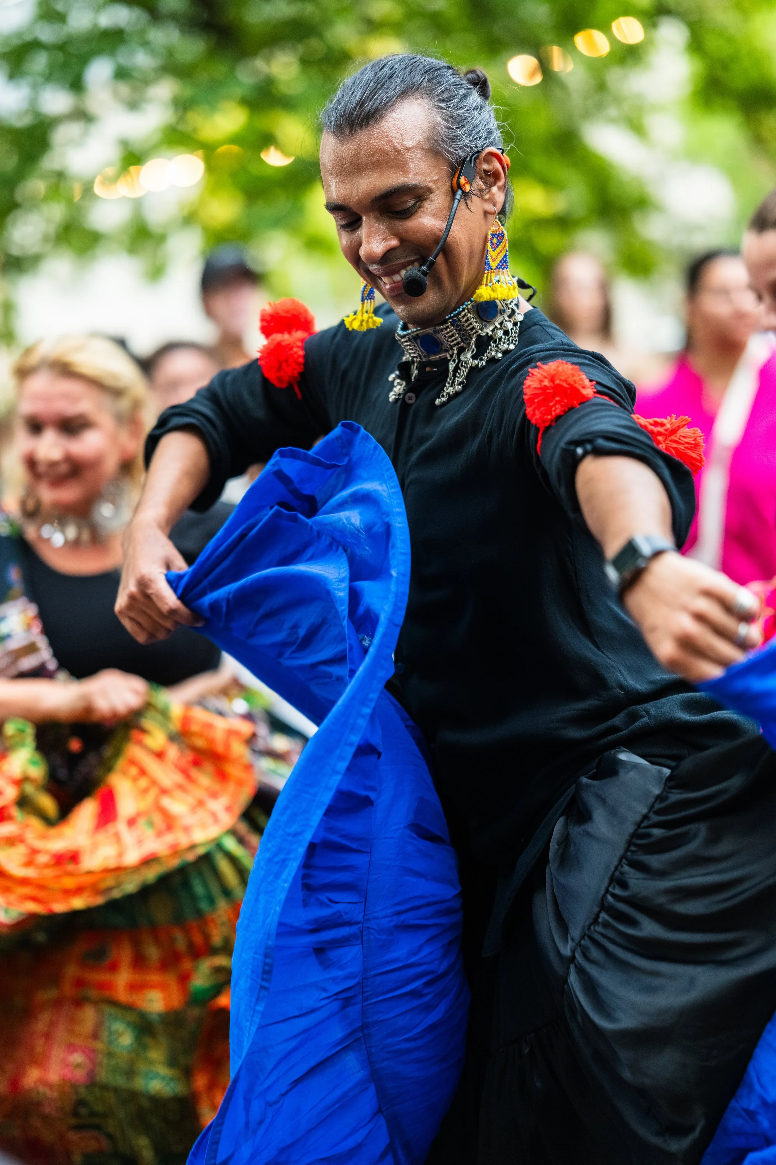 Instructor Swapnil demonstrating the fluid spins and expressive hand gestures of Rajasthani Kalbeliya dance.