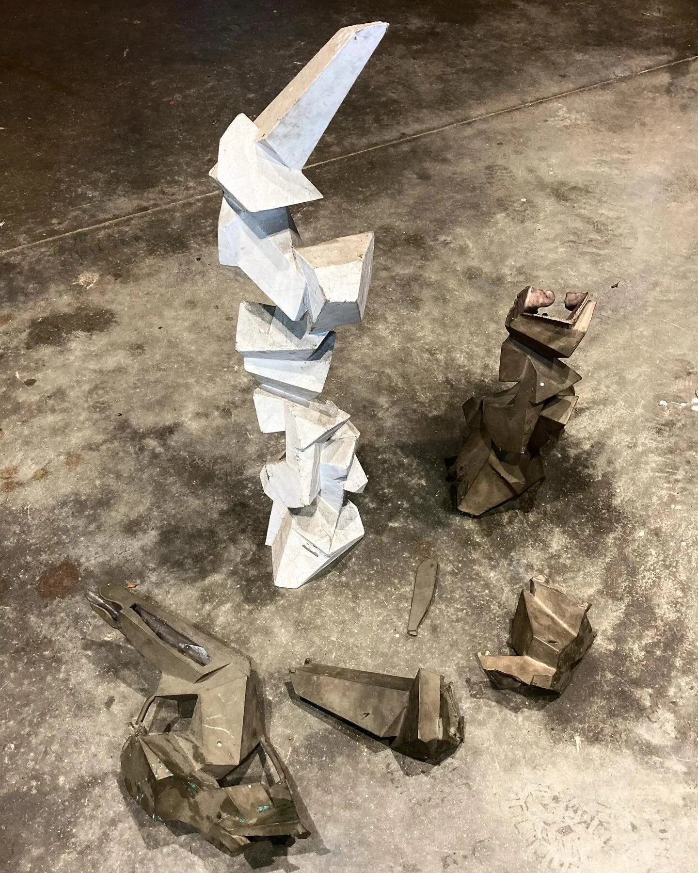 The white form is &lsquo;Elemental Mass Maquette&rsquo;, made from scrap polystyrene in 2015, covered with gum-backed framers tape, and painted white. The &lsquo;wreckage&rsquo; you see scattered about the base of the maquette are eye-wateringly expe