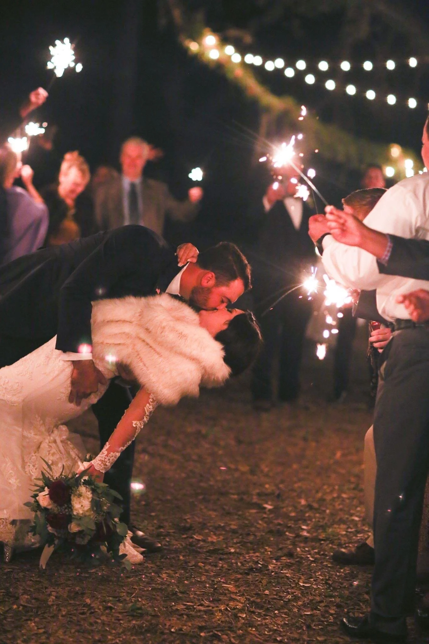 The going away kiss with sparklers.JPG