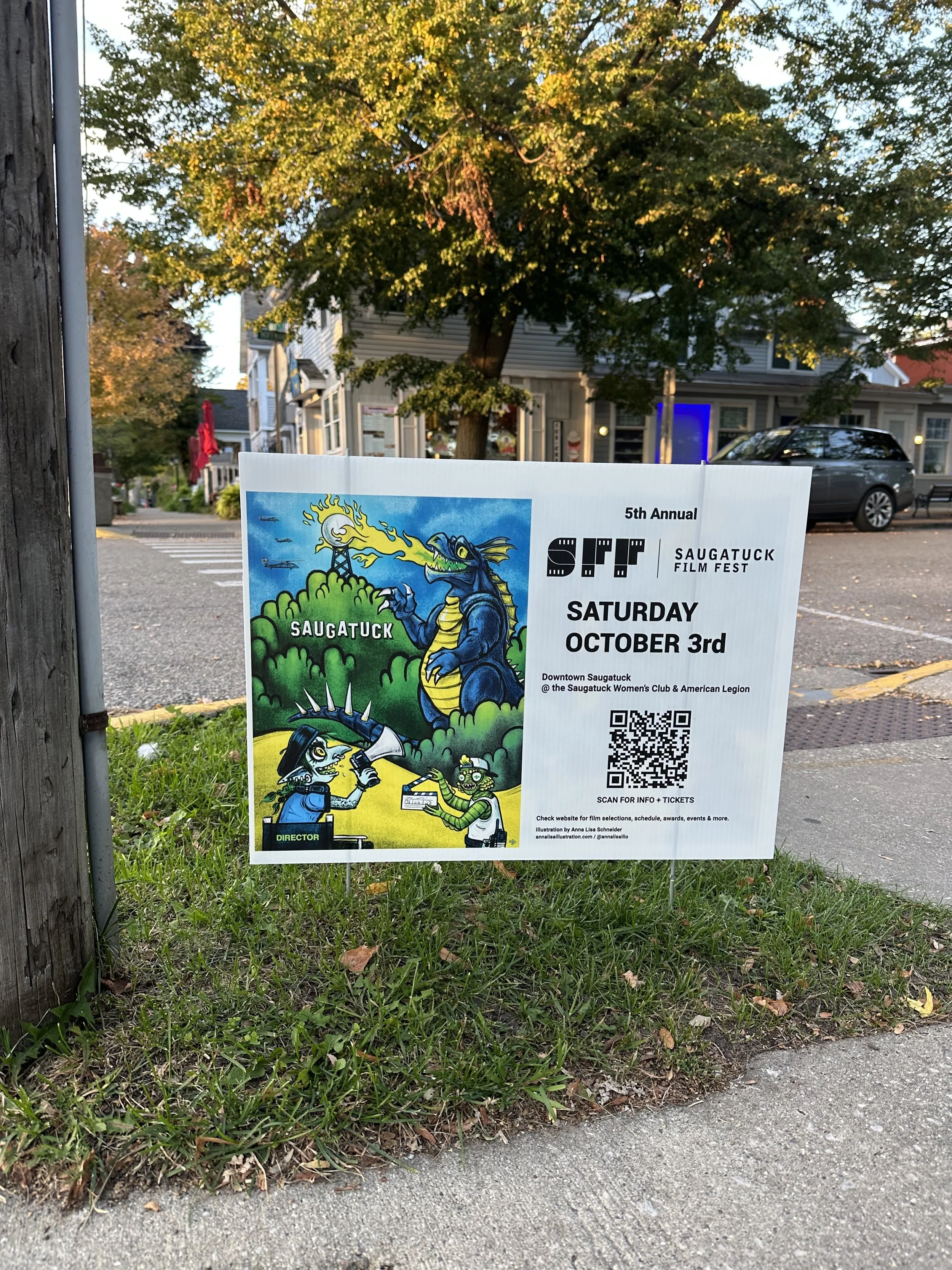 Yard sign featuring the poster