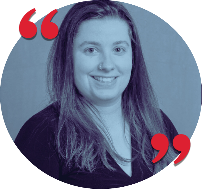 A woman with long, wavy hair, smiling, wearing a nose ring and a dark top, with red quotation mark graphics in the upper left and lower right corners.