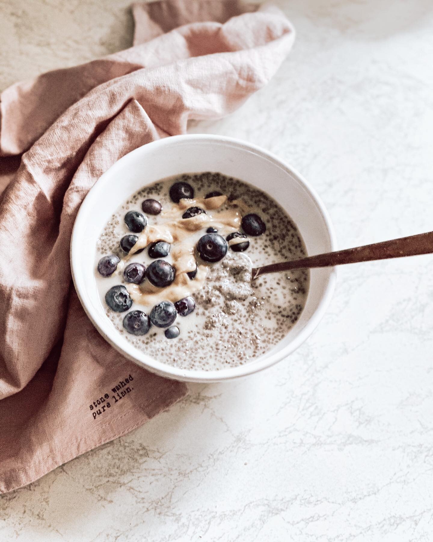 Warm blueberry cinnamon chia pudding for a rainy, moody day, but at least it&rsquo;s almost the weekend. 🤍🌿