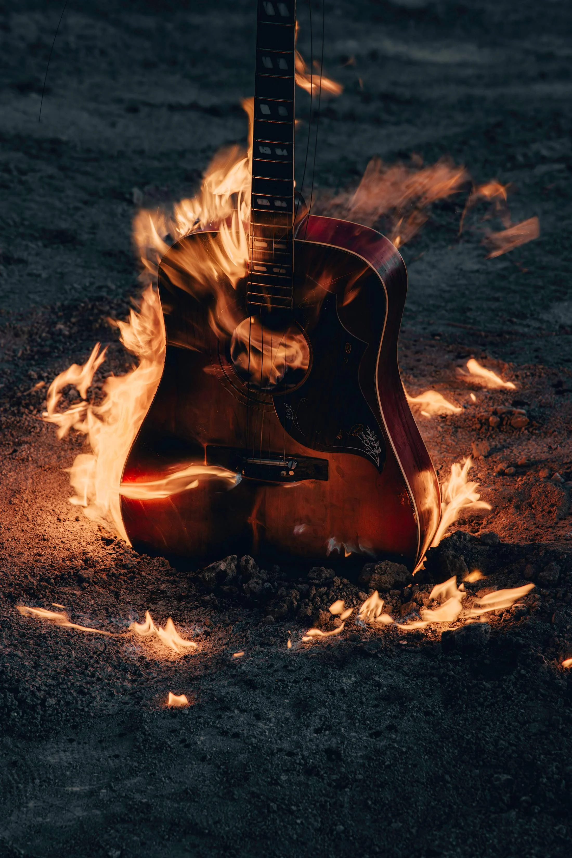 Acoustic Guitar on Fire in Desert