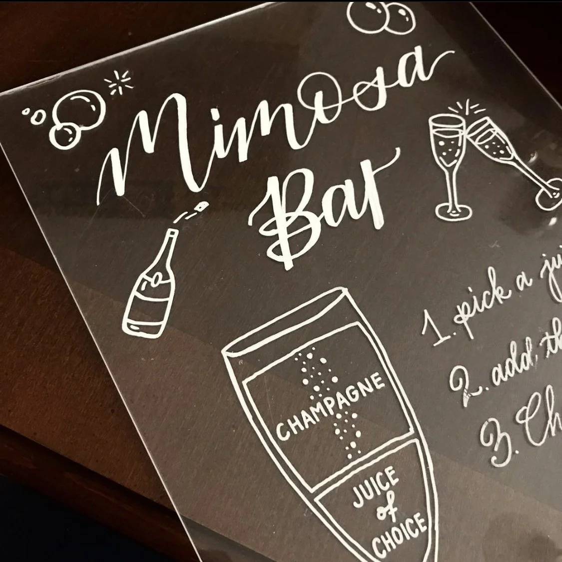 Custom acrylic sign for a mimosa bar