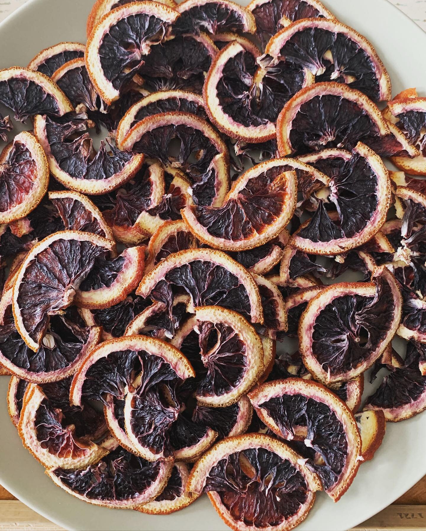 Dehydrating blood oranges &amp; citrus 🍊✨ By slicing unused citrus from events &amp; dehydrating them we create shelf stable garnish &amp; reduce waste. You can do this at home, too! We slice them thin on a mandolin then bake at 200 degrees for 2-4 