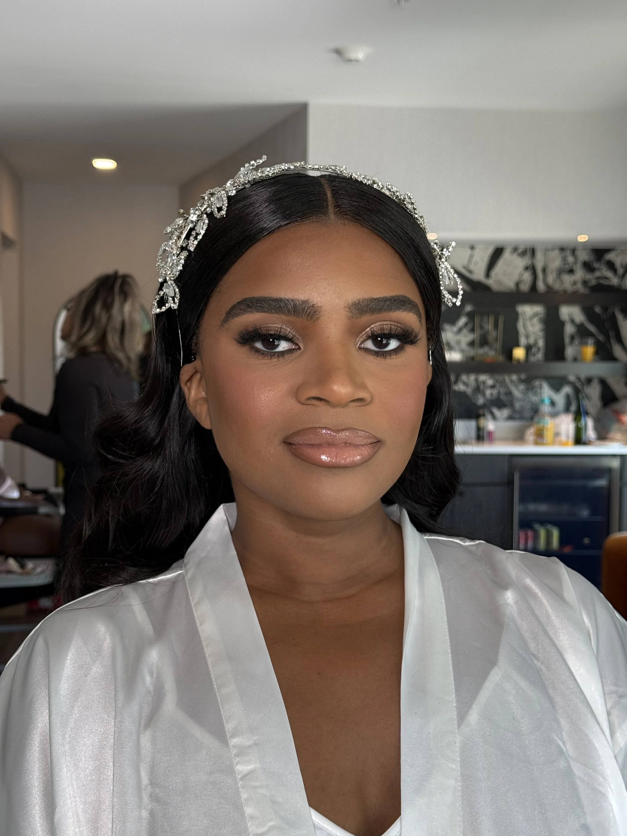 DewybyDej beautiful bronze makeup application on a black woman