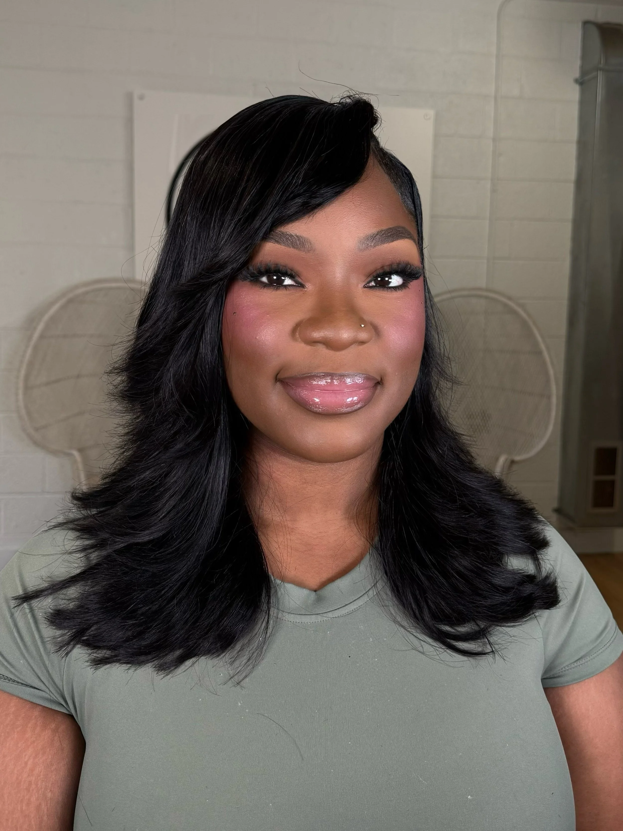 DewybyDej beautiful bronze makeup application on a black woman