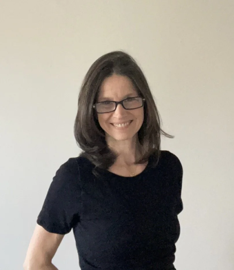 Portrait of a licensed psychotherapist in a calm, professional setting