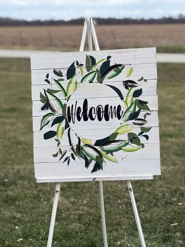 White Welcome Sign