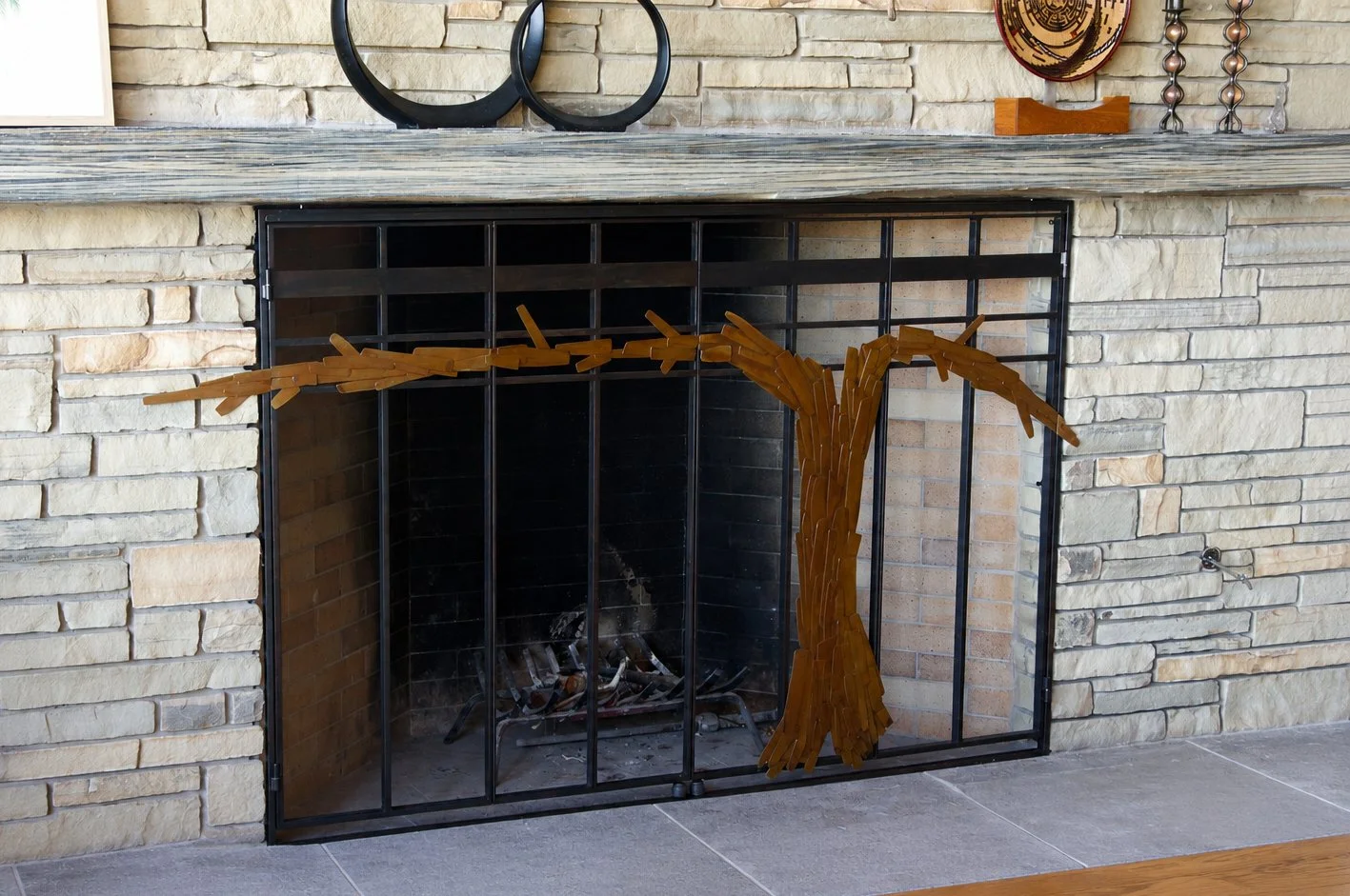 bronze and steel fireplace screen for a vineyard in livermore, California