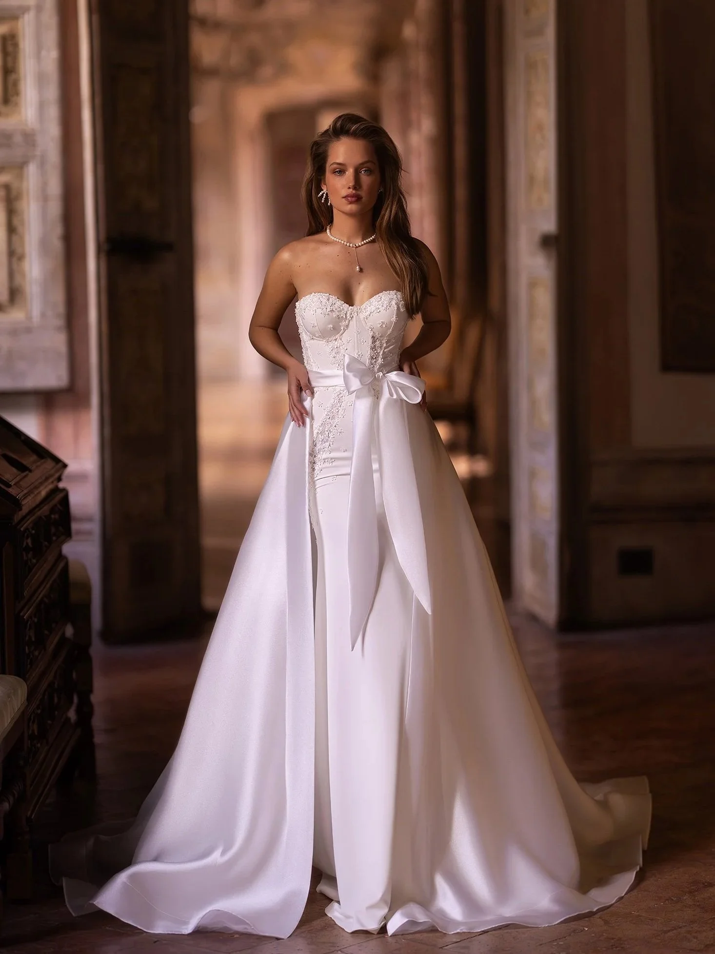 Desira bridal gown by Aria, Strapless sweetheart top with Satin and lace applique, minimal but sophisticated.
