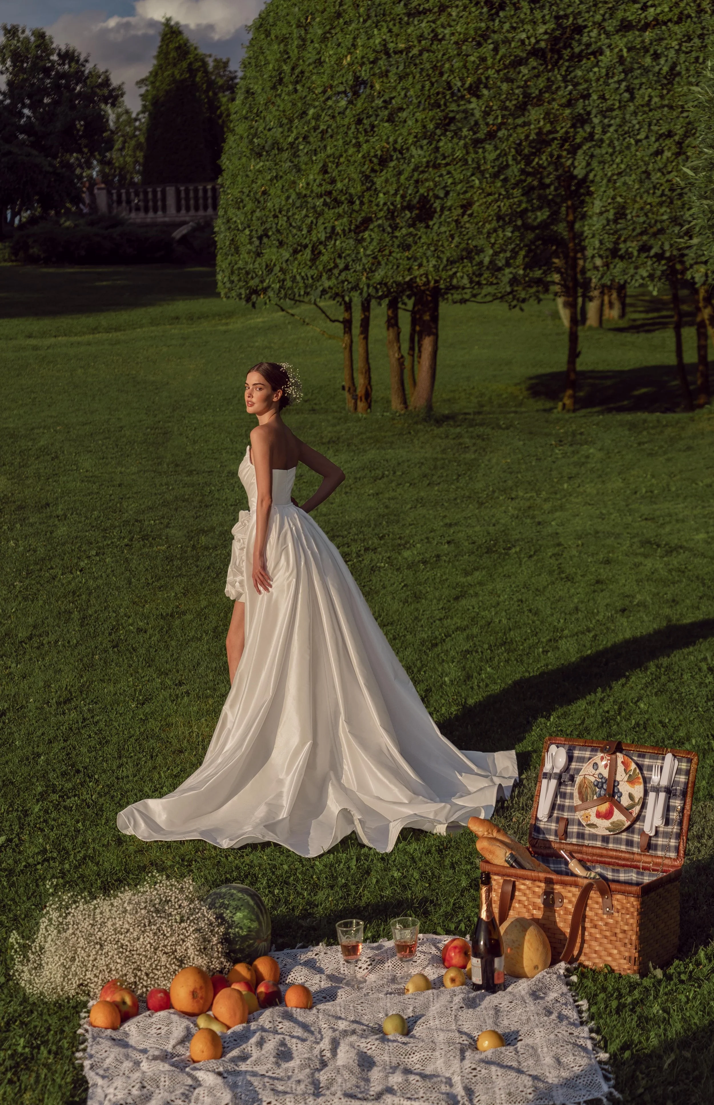 Back view of the Alessia mini taffeta wedding dress without overskirt, showing the sleek silhouette and floral skirt detail.