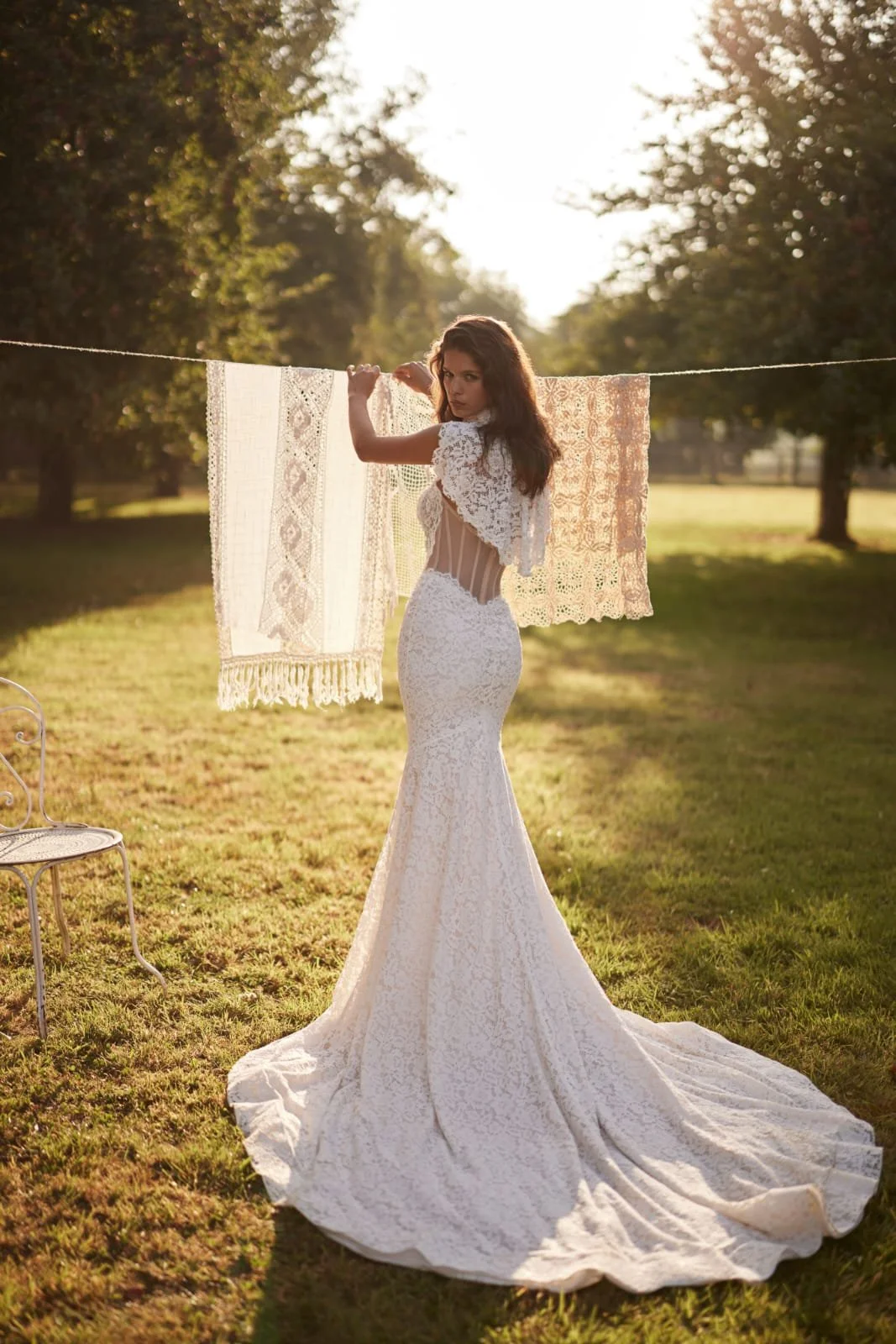 Sheer mesh back of the LunaRose wedding gown with vertical detailing and zipper closure