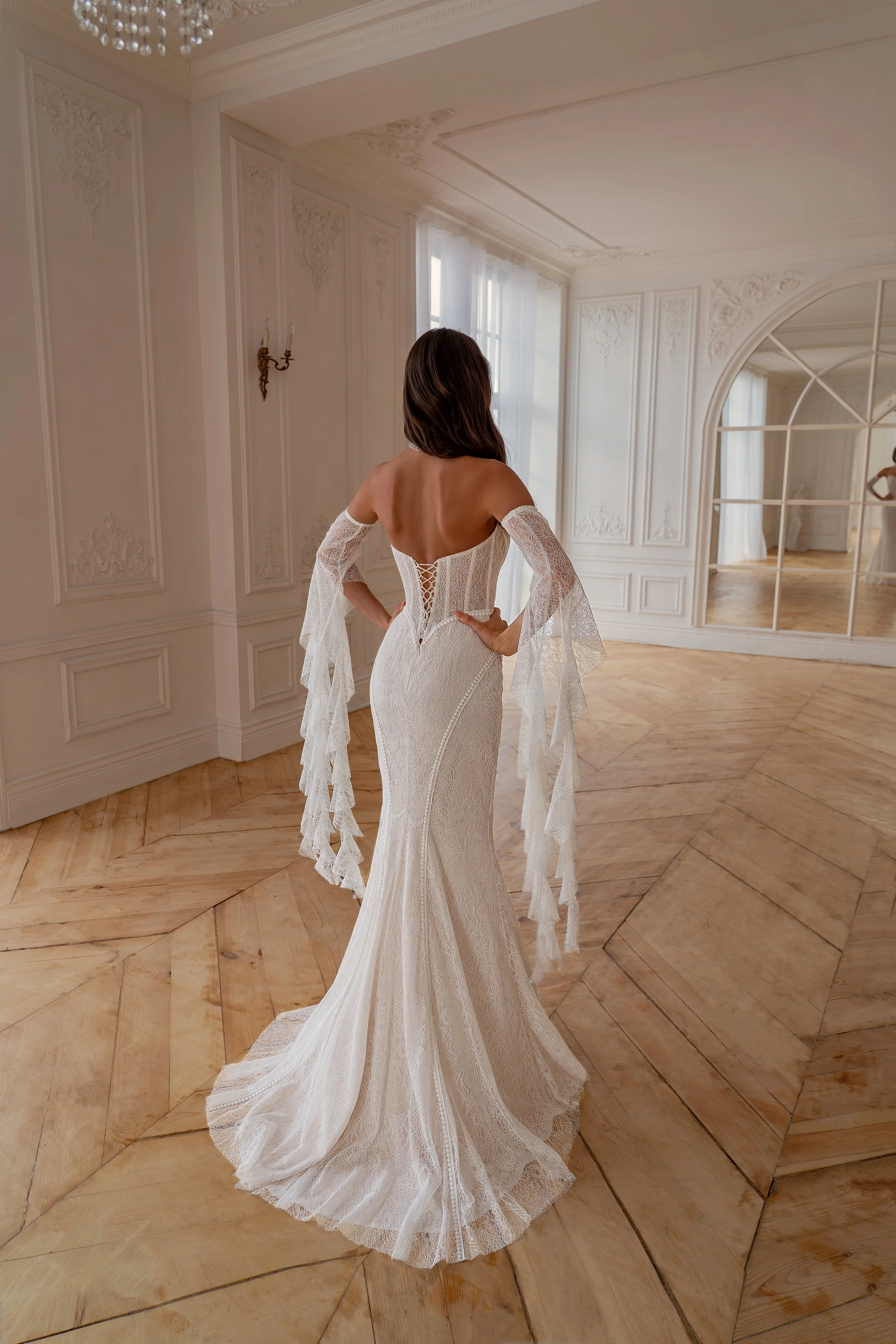 Starla bridal gown full look with featherlight lace and statement sleeves, editorial pose