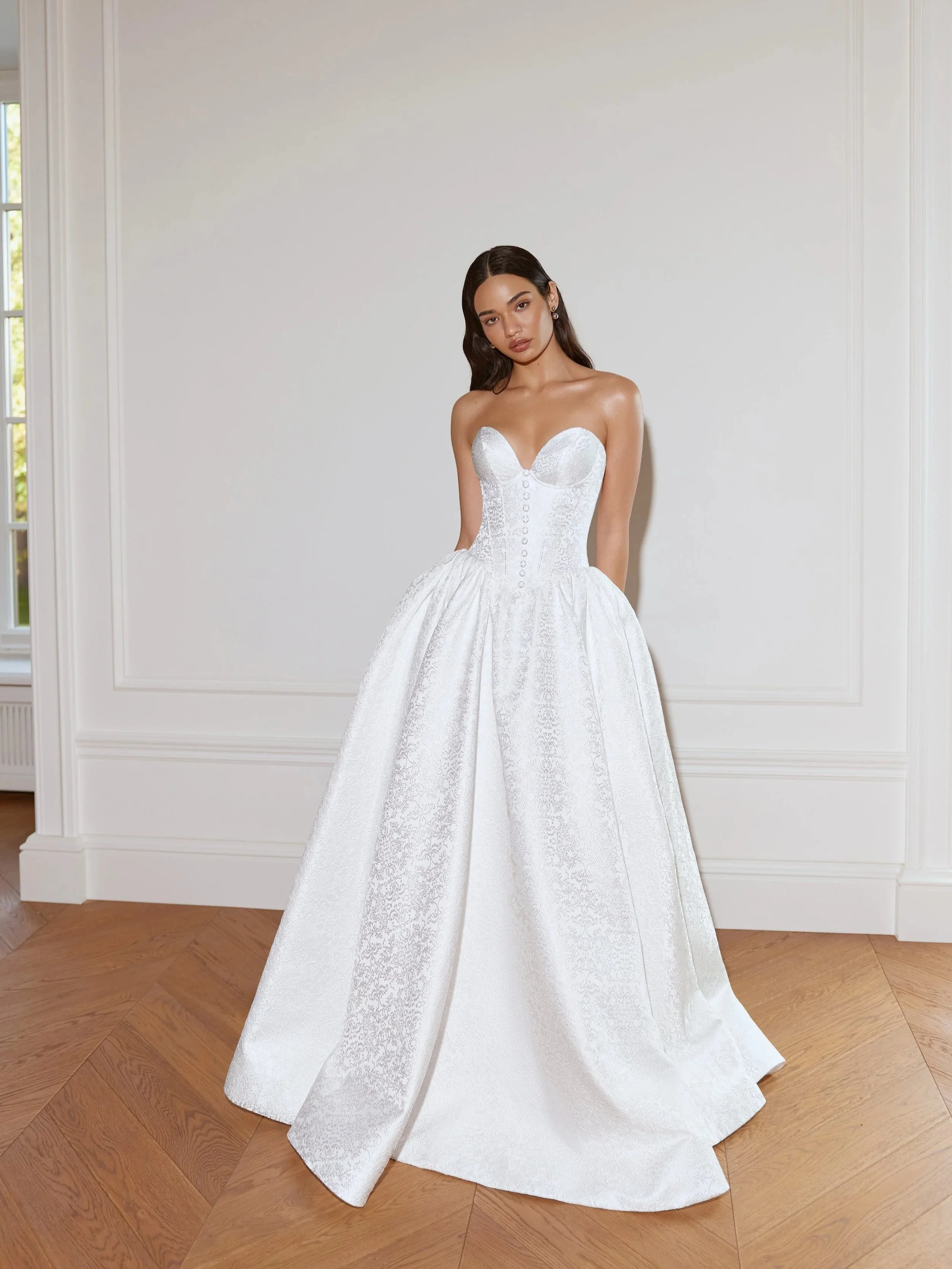 Aurore wedding dress by Ari Villoso, Jacquard lace with sweetheart strapless corset. Ball gown.