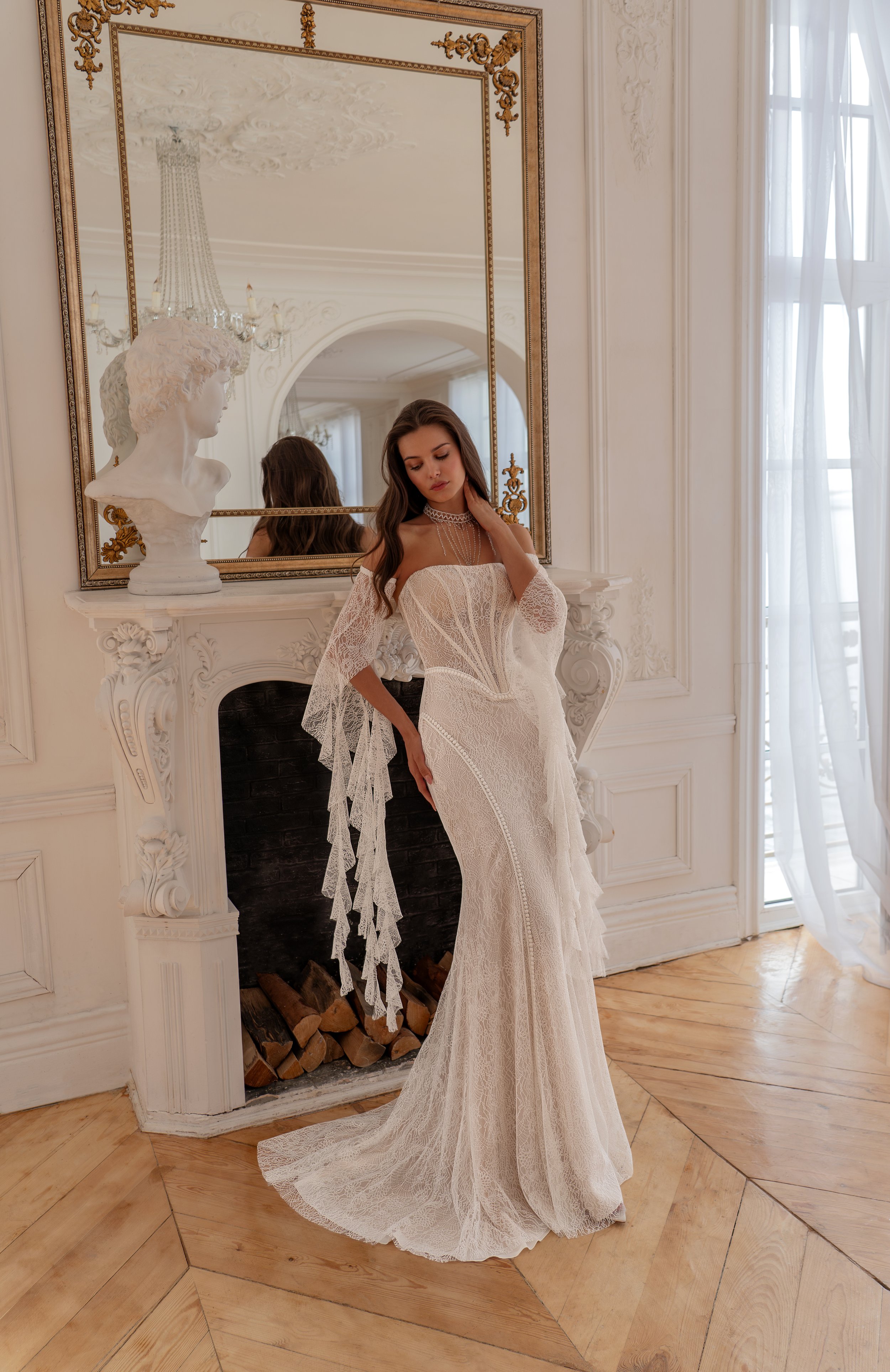 Starla lace wedding dress with basque waist and straight neckline, fitted silhouette front view