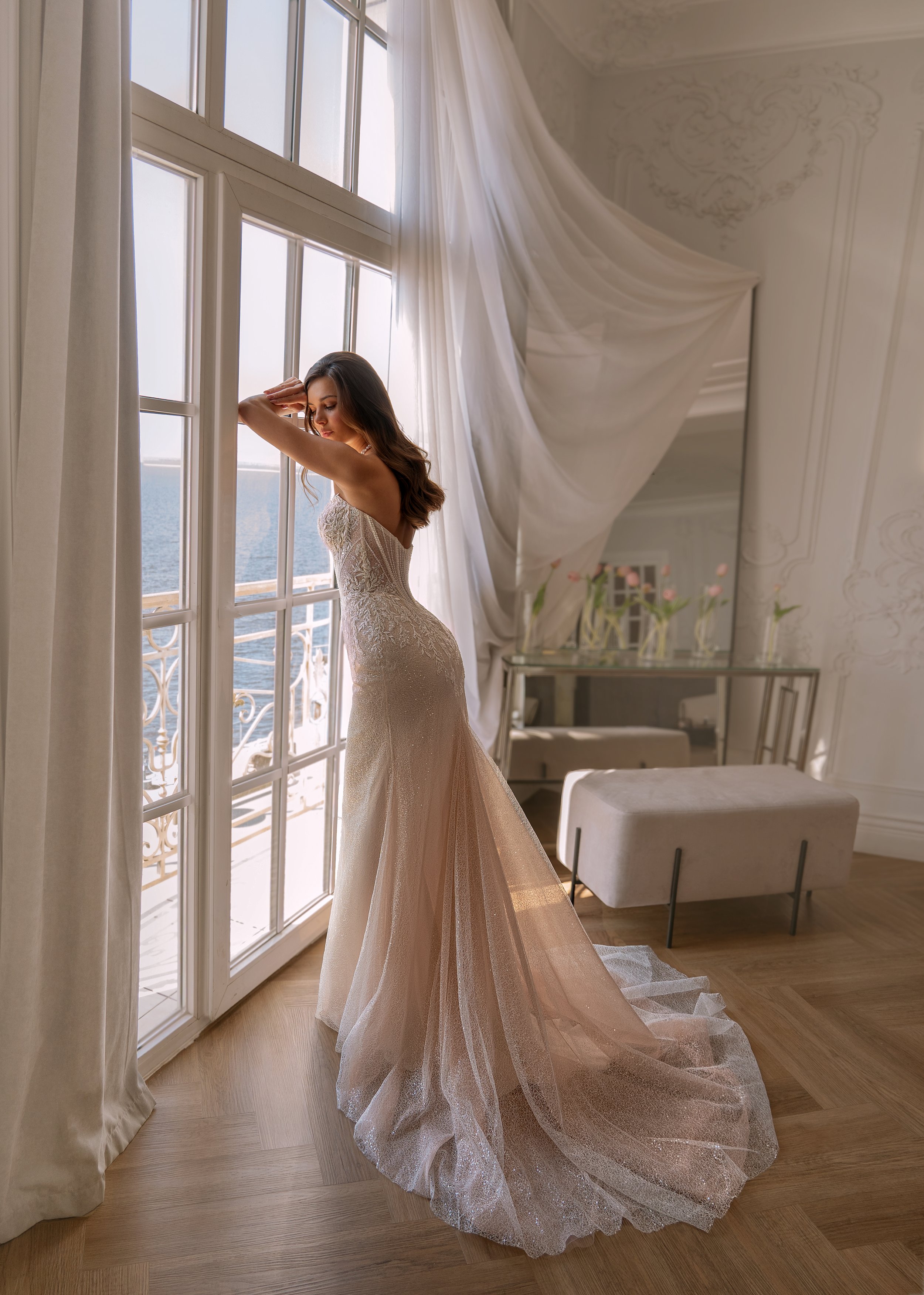 Sparkly lace bridal gown with beading and fitted mermaid silhouette close-up