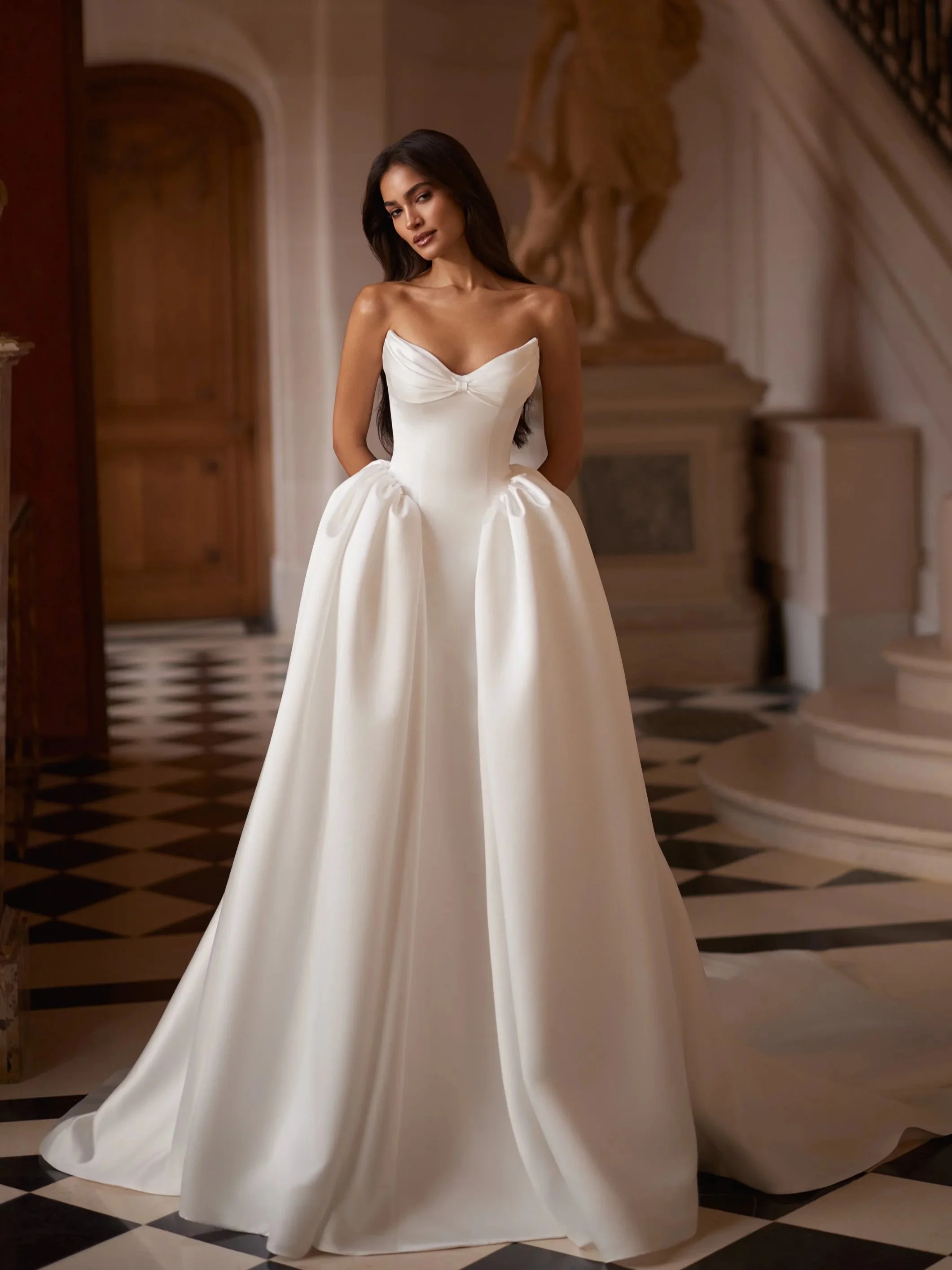 Luce Sposa Kirra mikado ball gown with cateye neckline and beaituful satin.