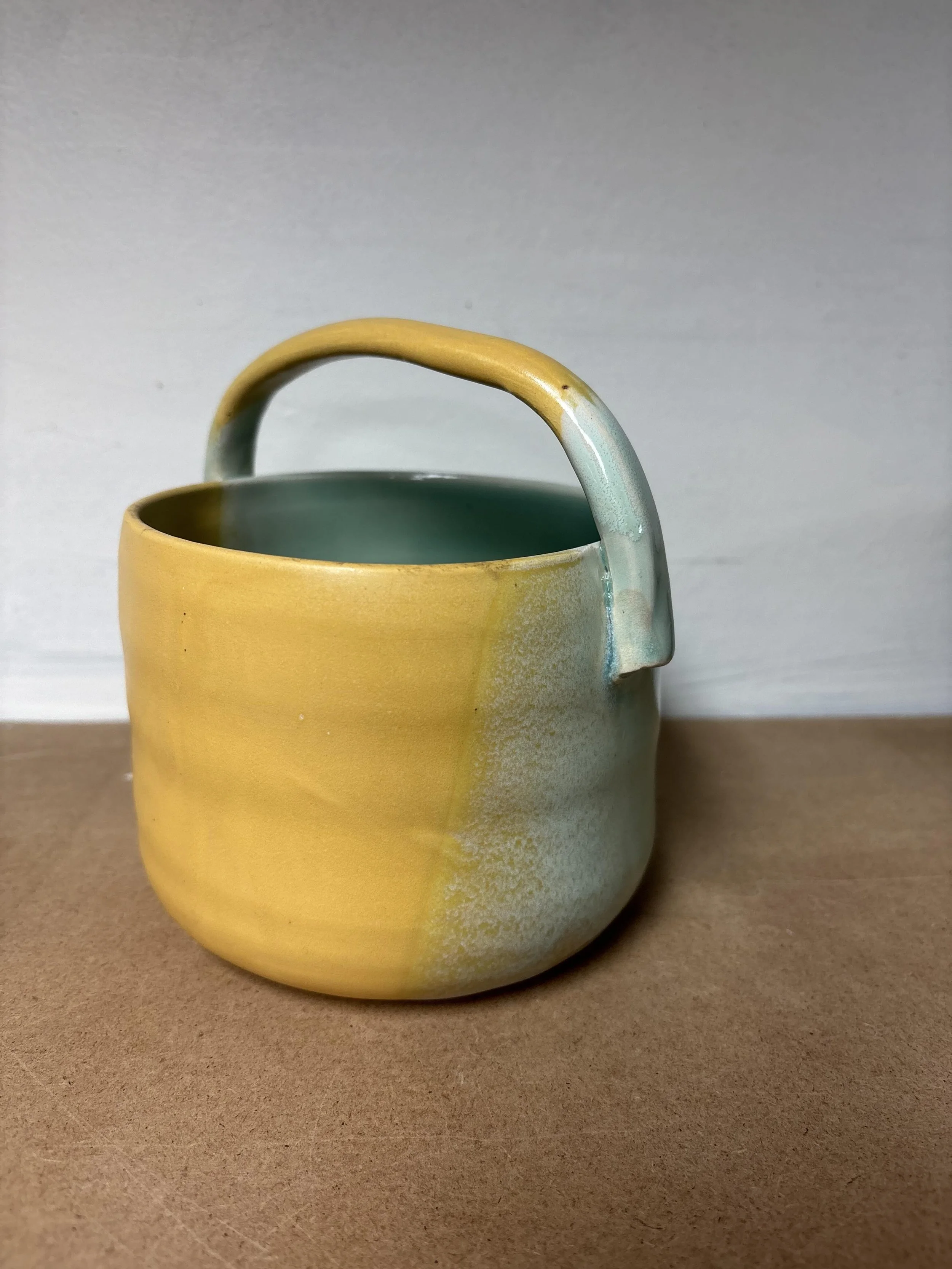 Vase with handle