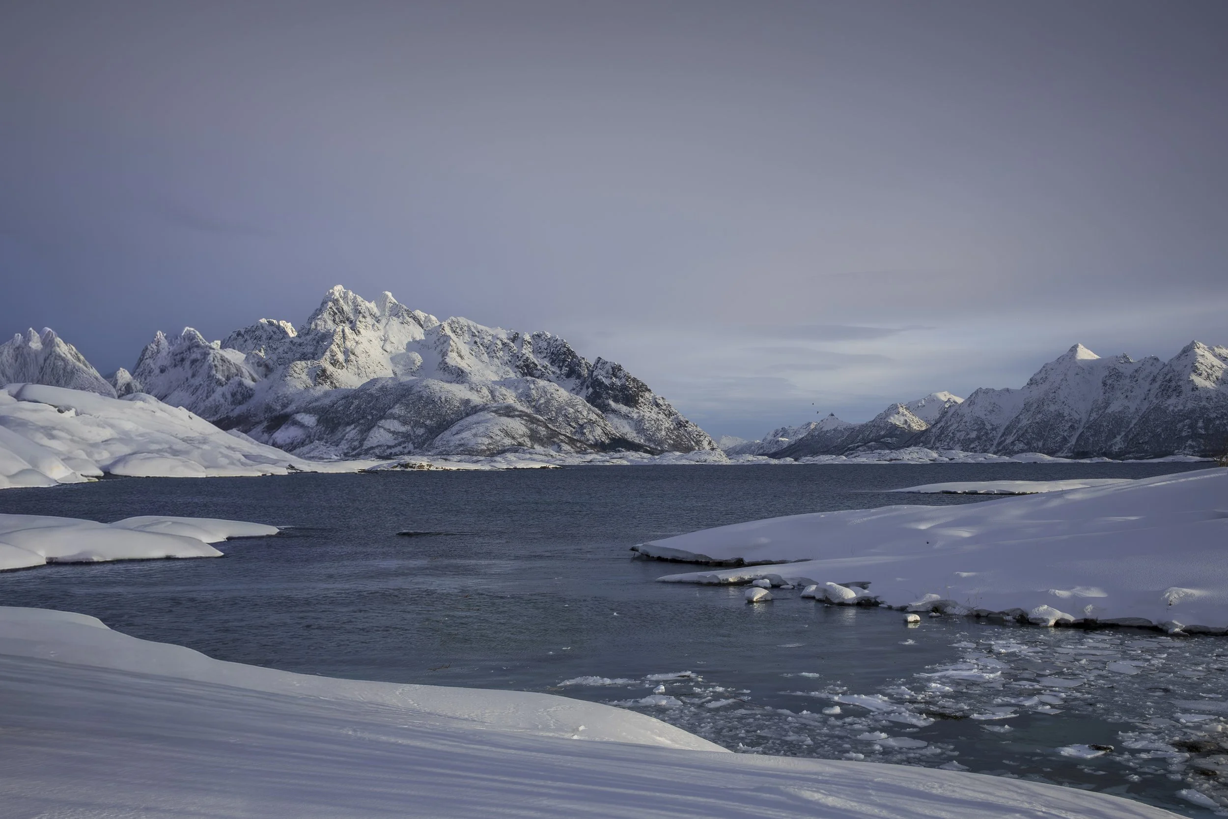 Svolvaer, Lofoten, Norway 2026. This picture was taken in a bit of a rush as we were not allowed to stop; so instead we were walking on the side of a snowy road. It was very cold but the scene and the light were good.