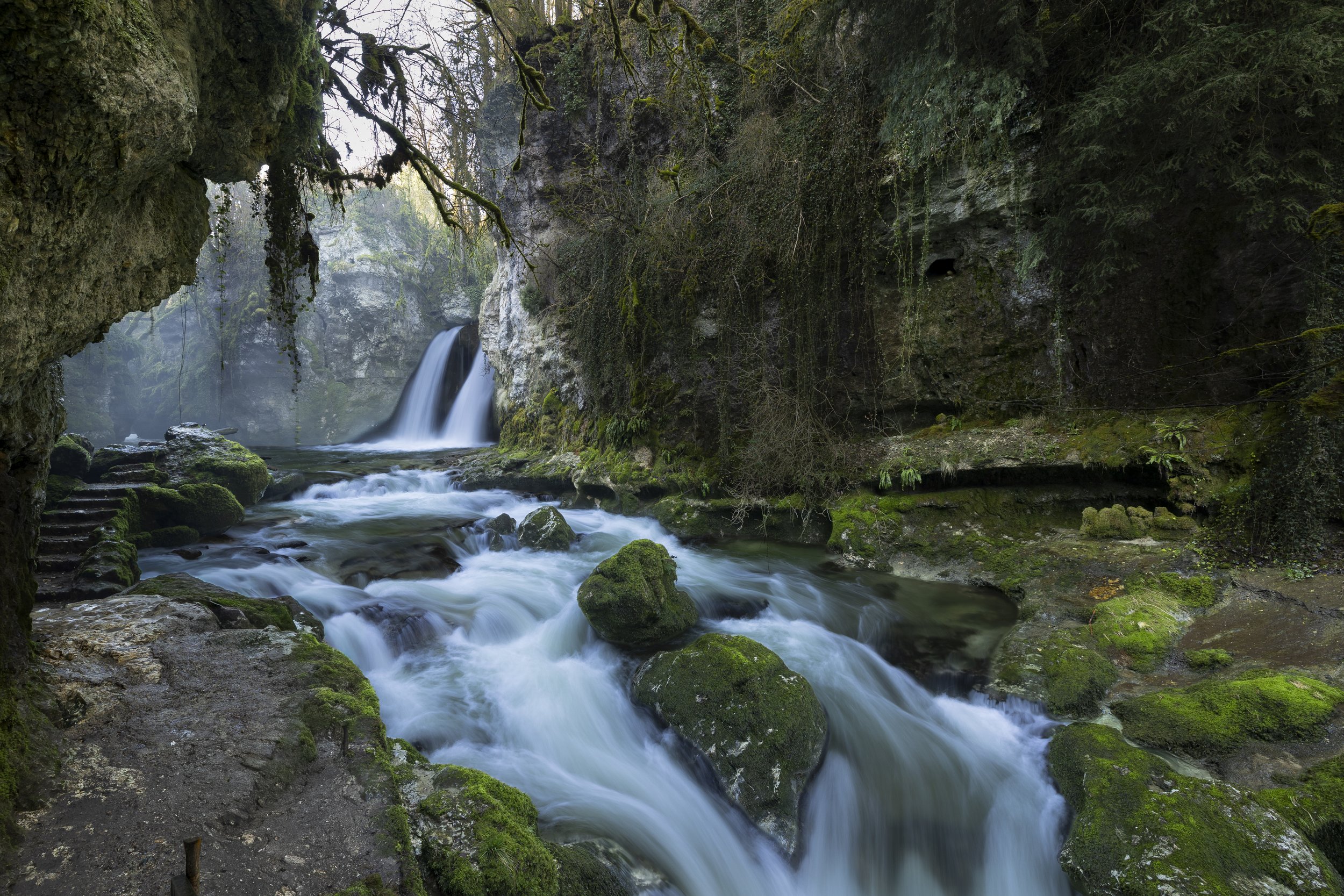 "Energy of Energy" - La Tine de Conflens, 2026. The Tine de Conflens is an impressive waterfall, where the Venoge and the Veyron meet in a magnificent place of rocks. Is a bit of a hike but easy one, but is slippery when is wet.
