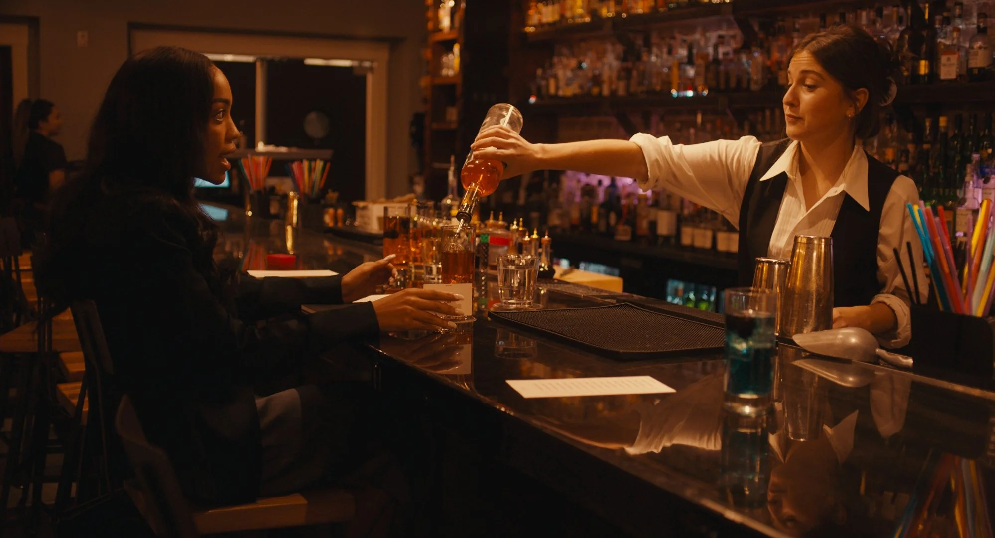 Anna (played by Brianna Roberts) and 99 (played by Katie Rodgers)