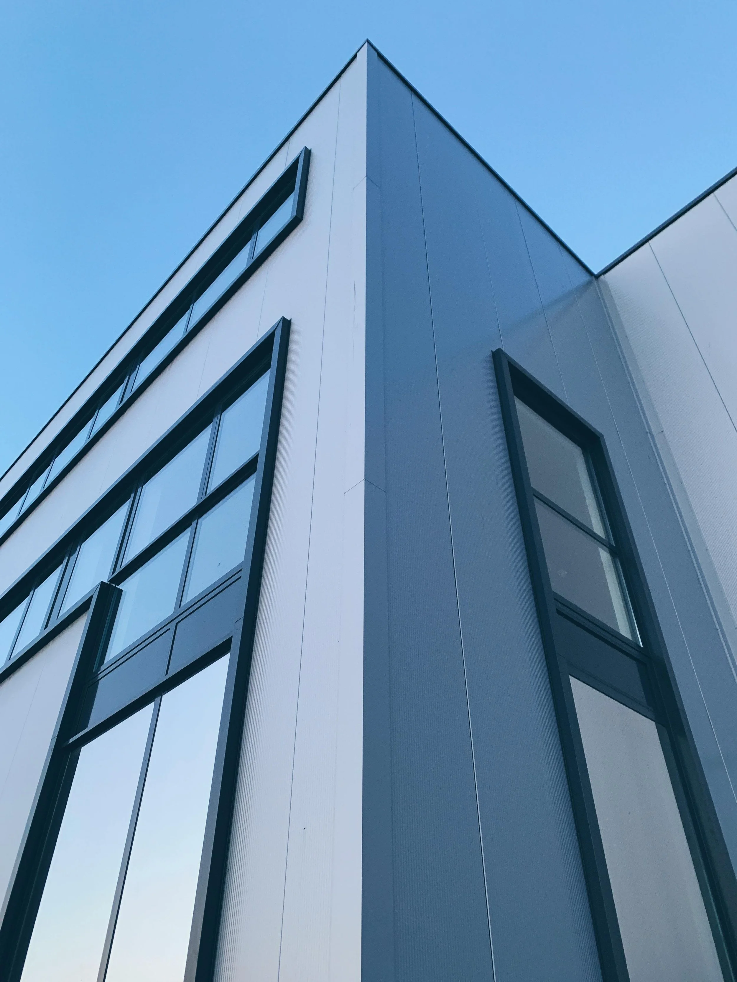 Modern commercial building facade — PDC project management services for office and industrial fit-out