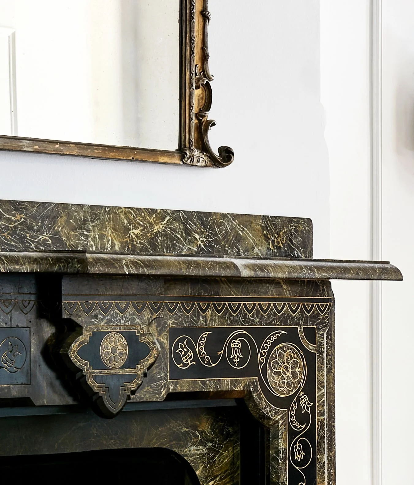 Antique fireplace and mirror