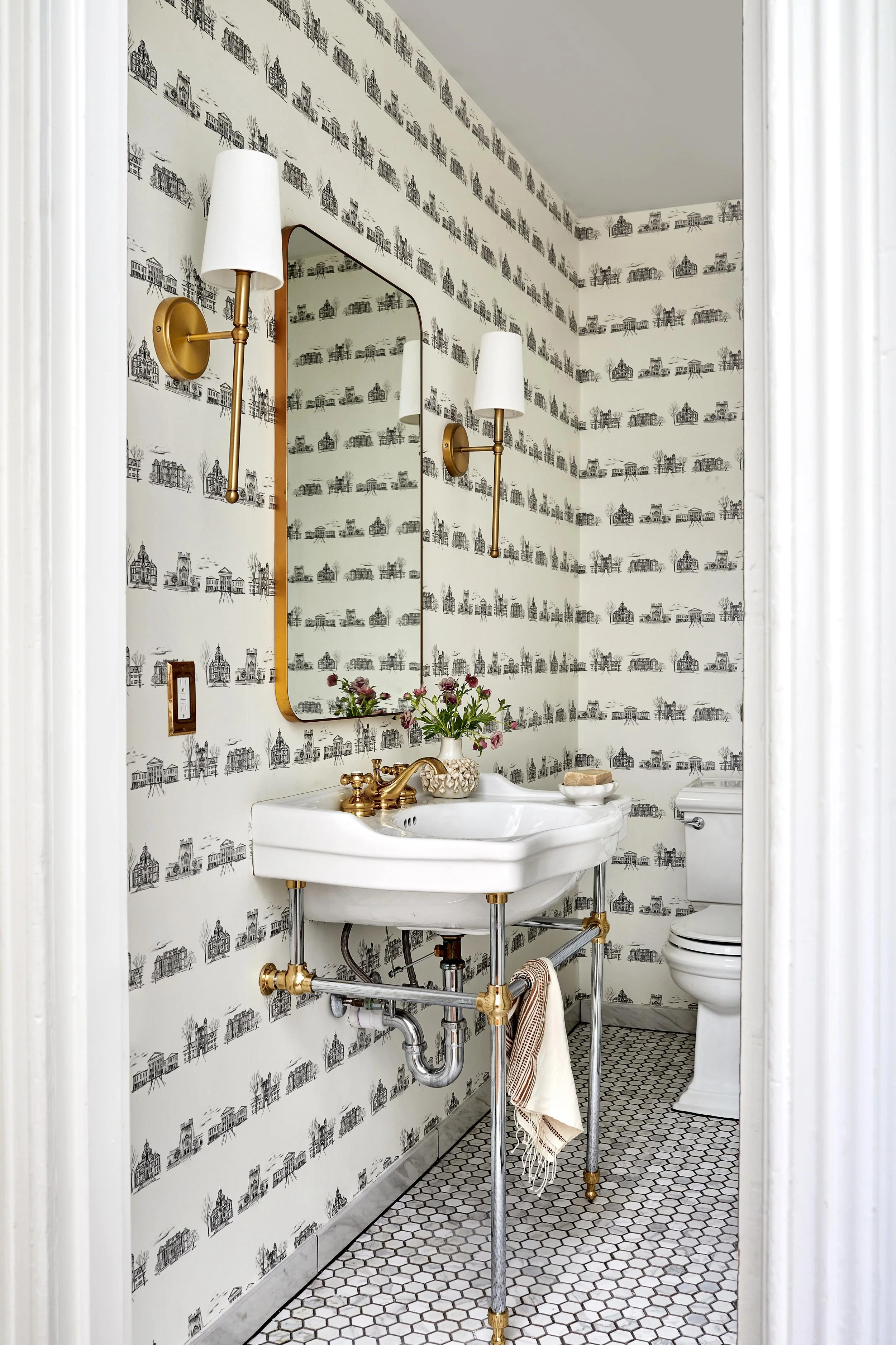 Powder room wallpaper in traditional rowhouse