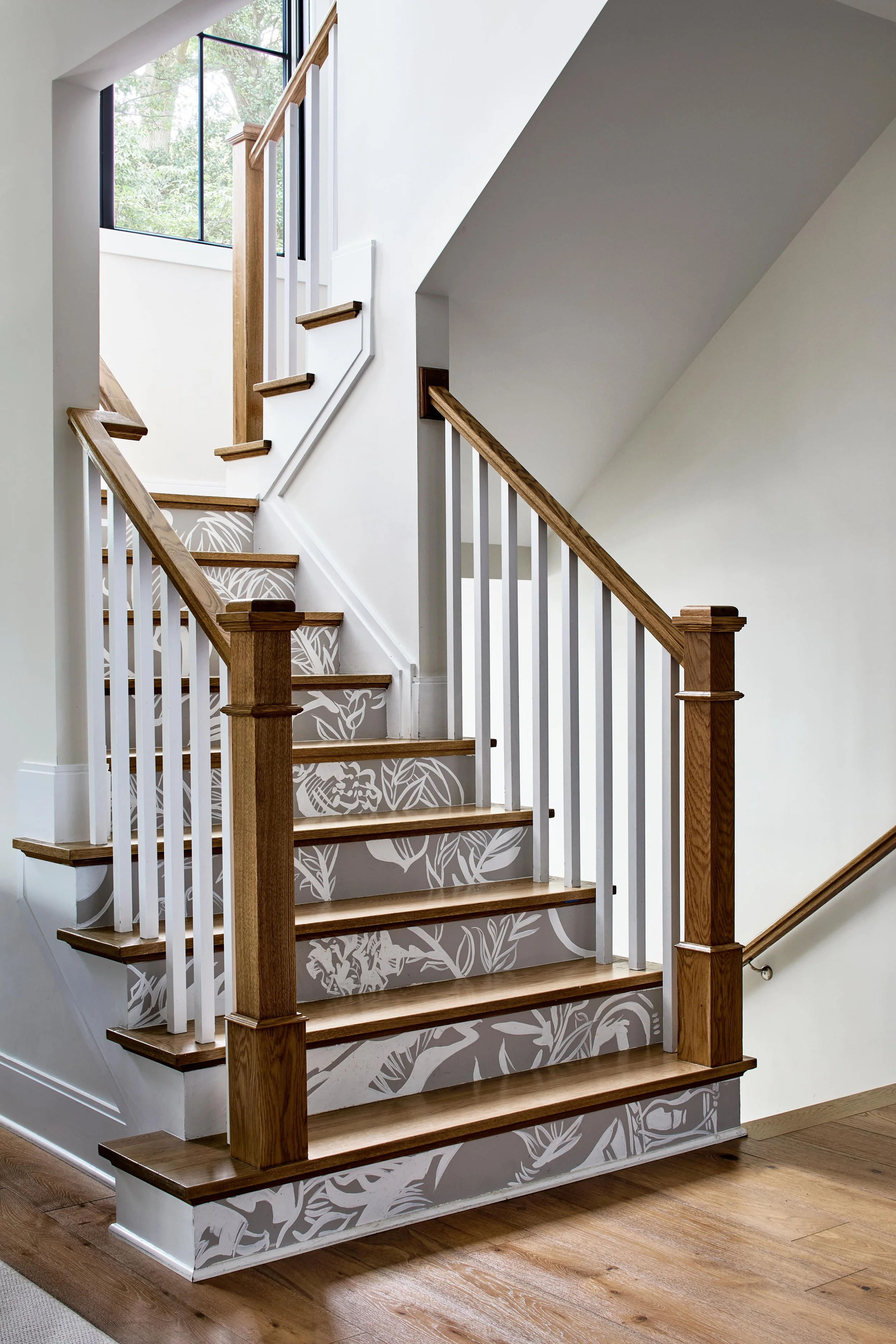 Painted stair risers in custom Maryland home