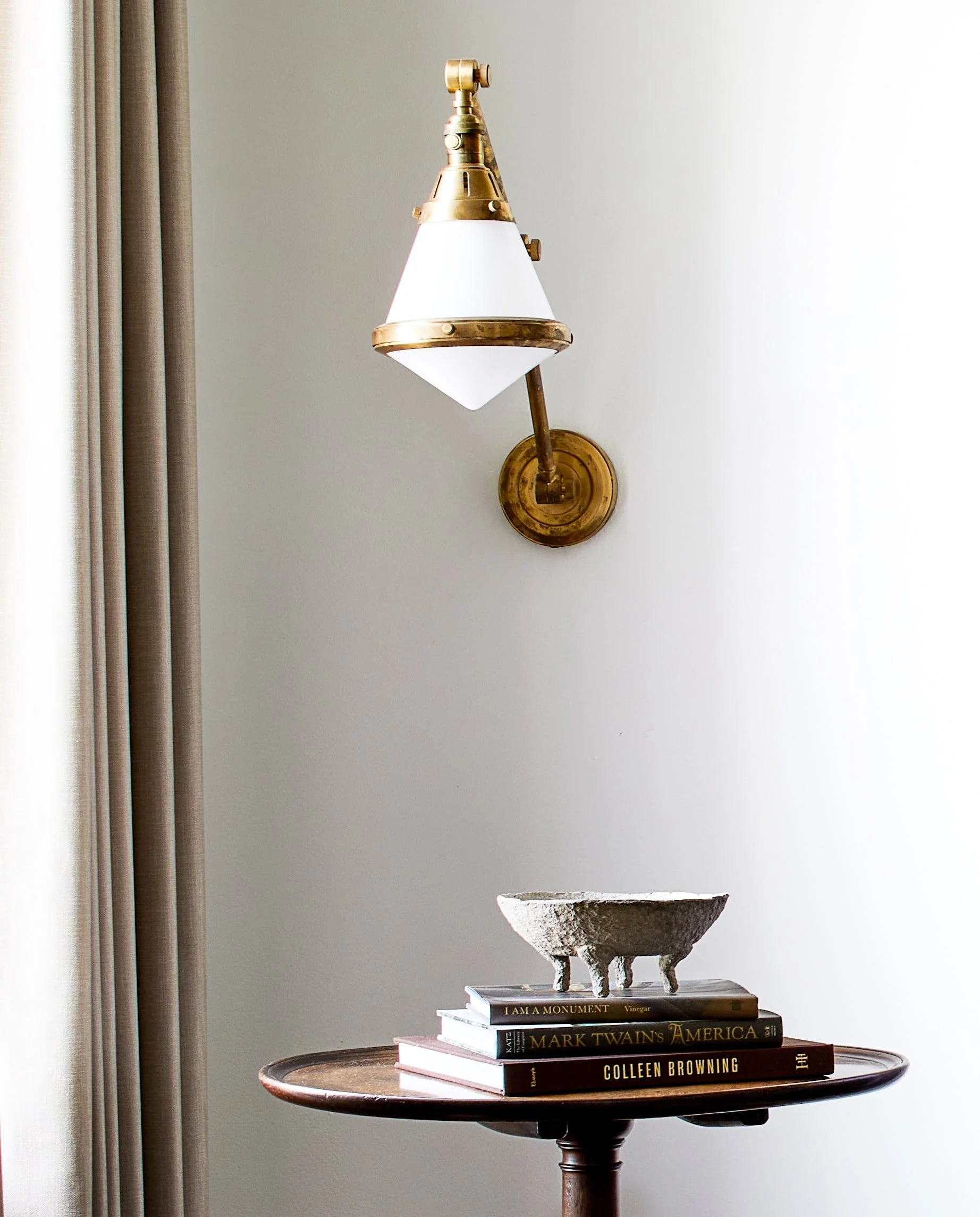 Sconce over side table