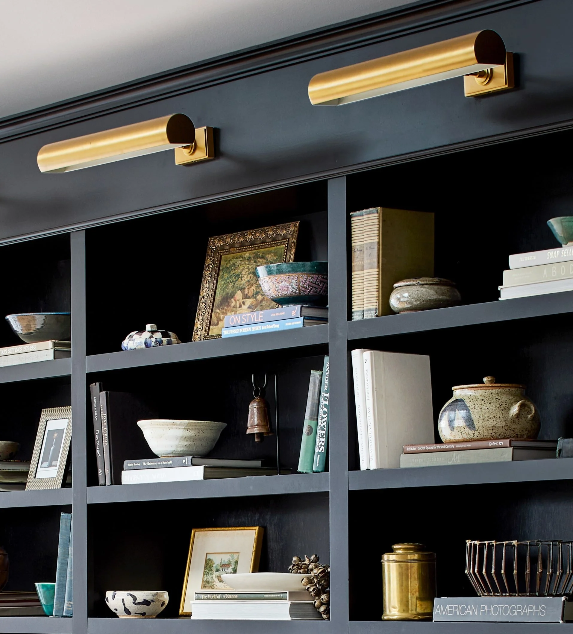 Sconces over built-in bookcase
