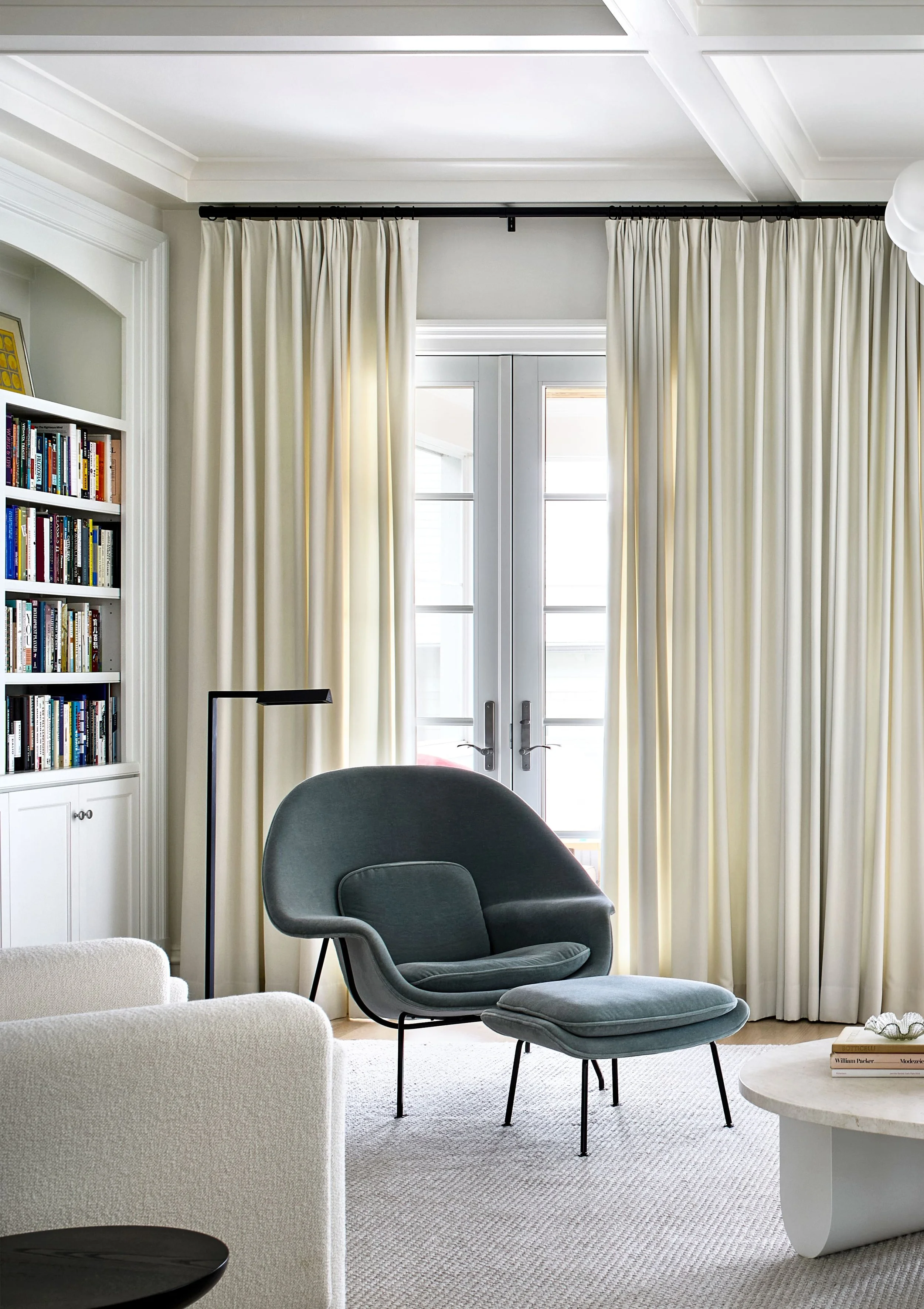 Colorful womb chair in white room