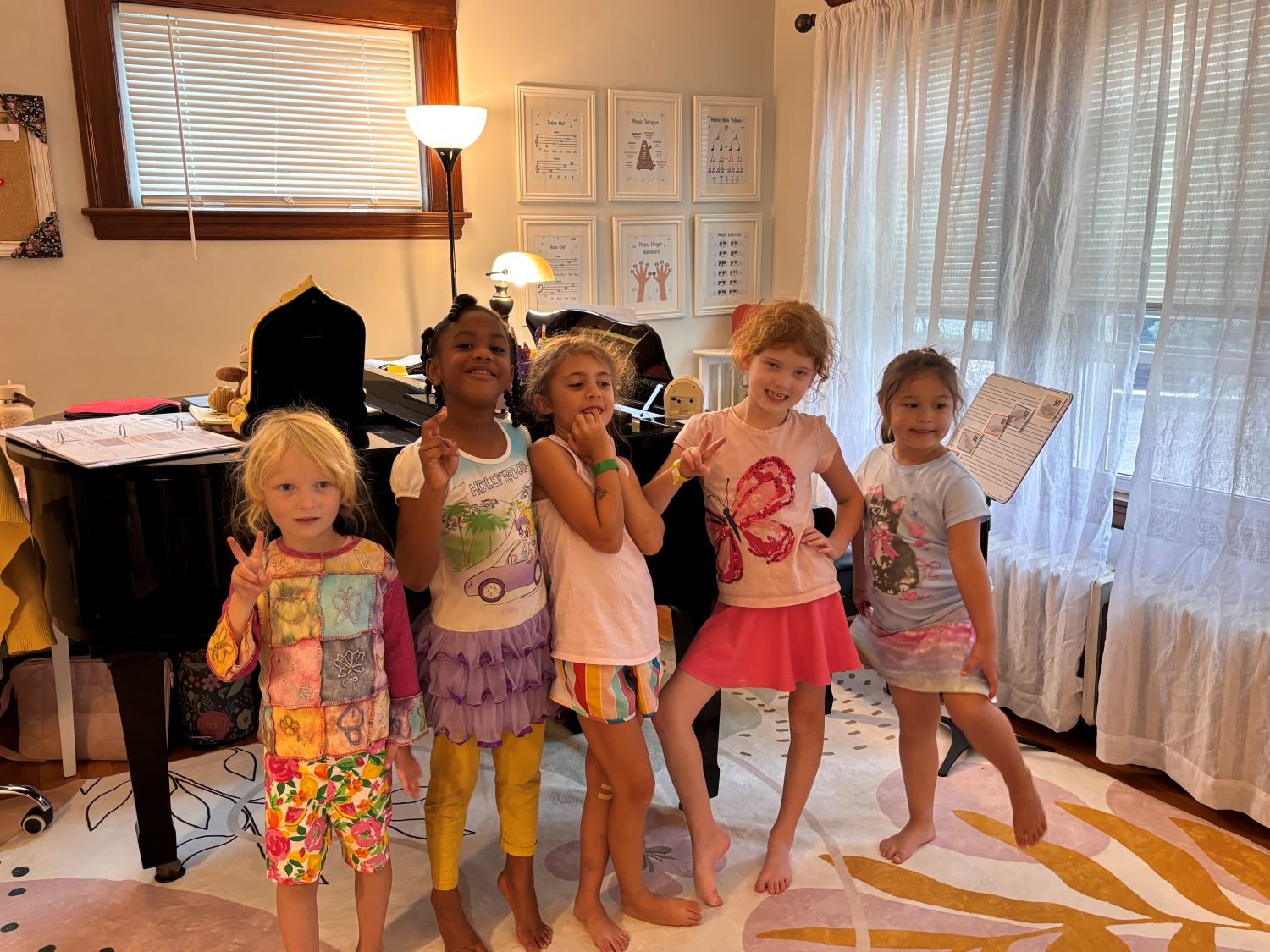 Five young voice students taking voice lessons for kids and teens in Boston, MA.