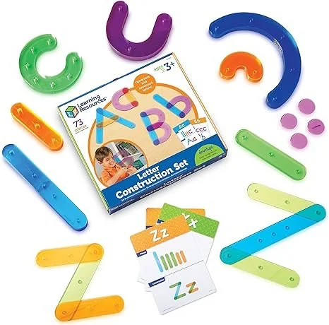 Colorful plastic letter and number construction set with a box and instruction cards.