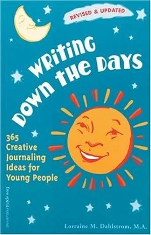 Cover of a book titled "Writing Down the Days" with a smiling sun, a moon, and stars on a blue background. It mentions 365 creative journaling ideas for young people and notes it is revised and updated.