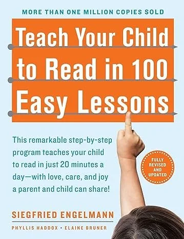 Book cover titled 'Teach Your Child to Read in 100 Easy Lessons' with a pointing hand and a small orange circle indicating 'Fully Revised and Updated'.